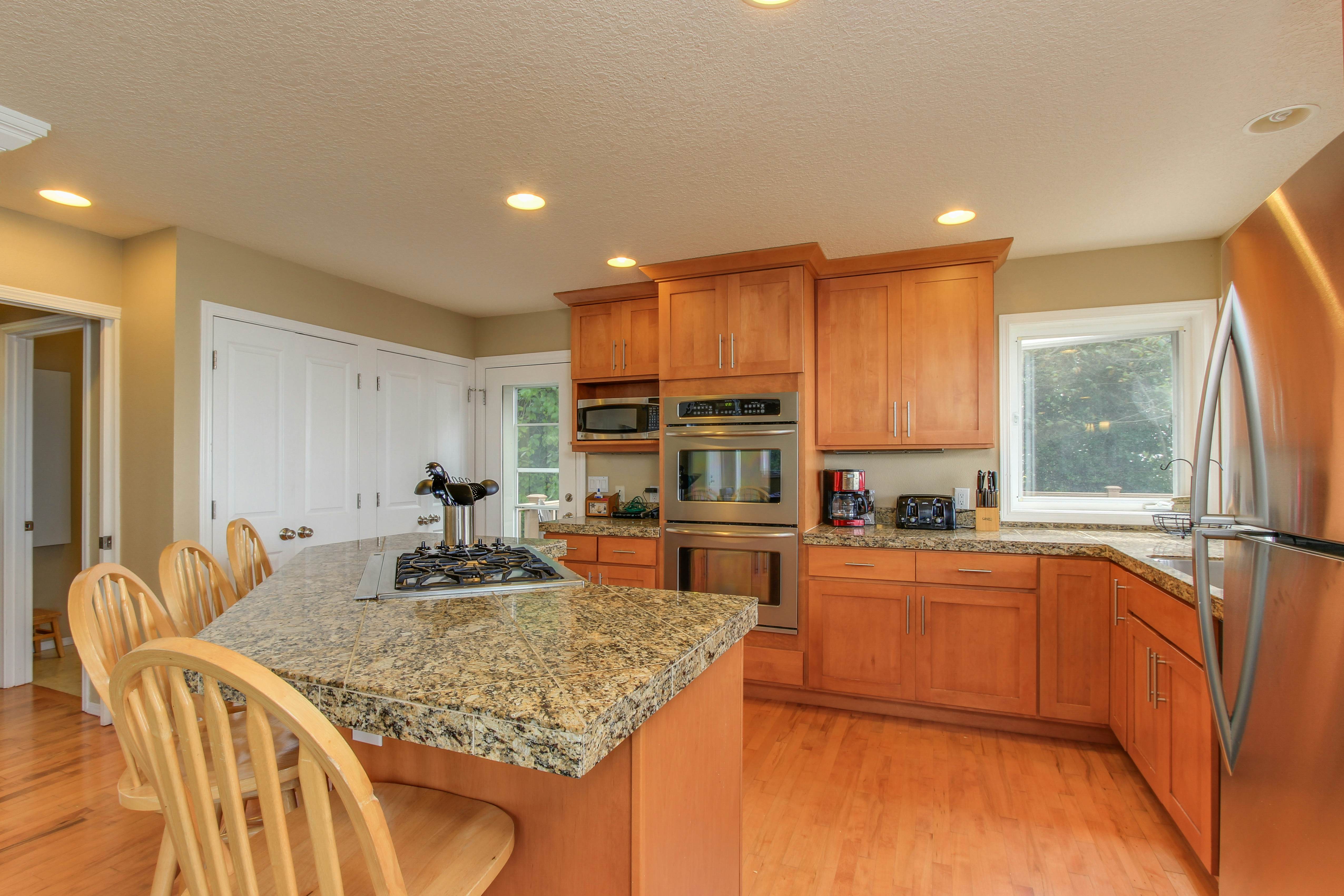 Sunlit home with gorgeous ocean views big decks and hot tub