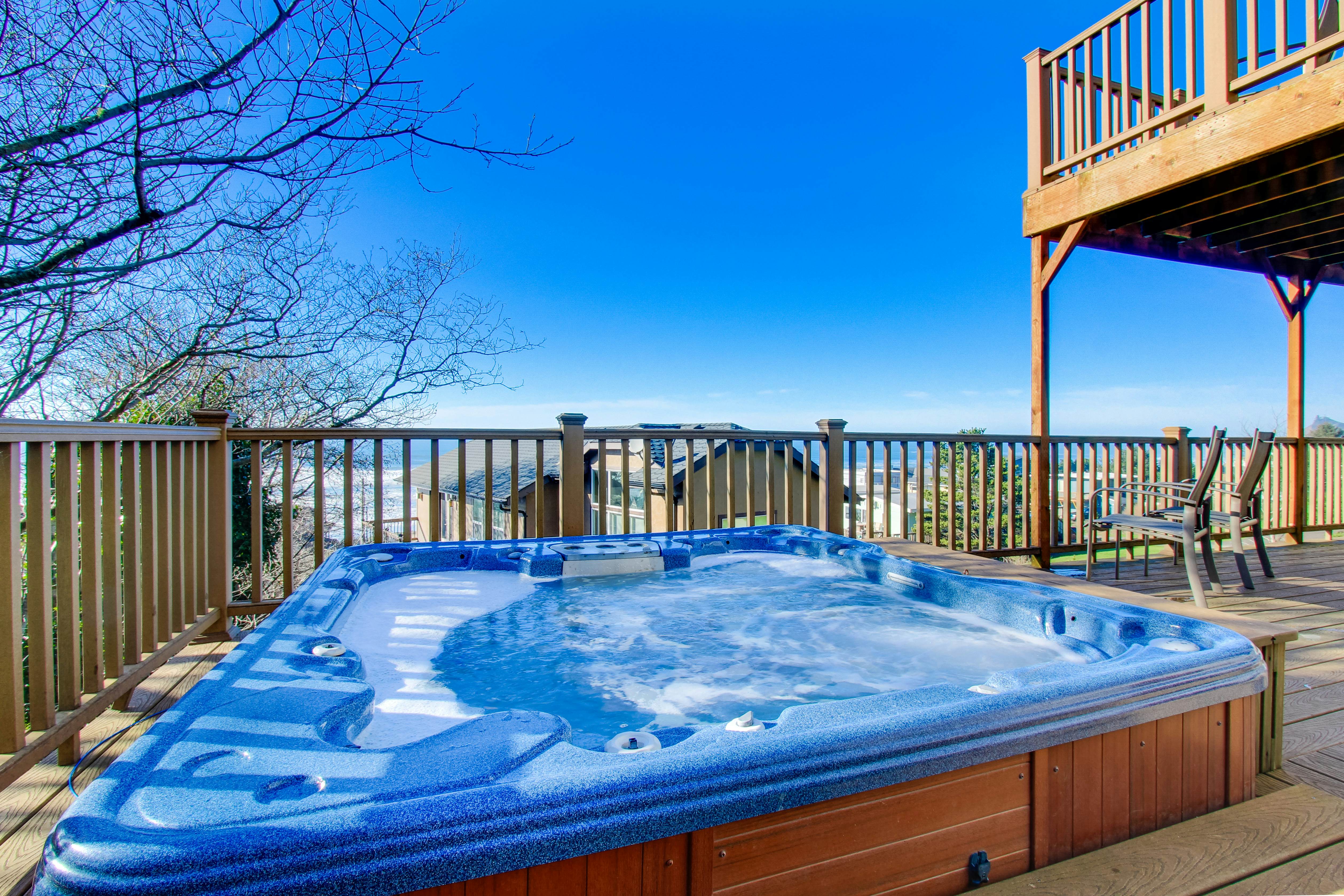 Sunlit home with gorgeous ocean views big decks and hot tub