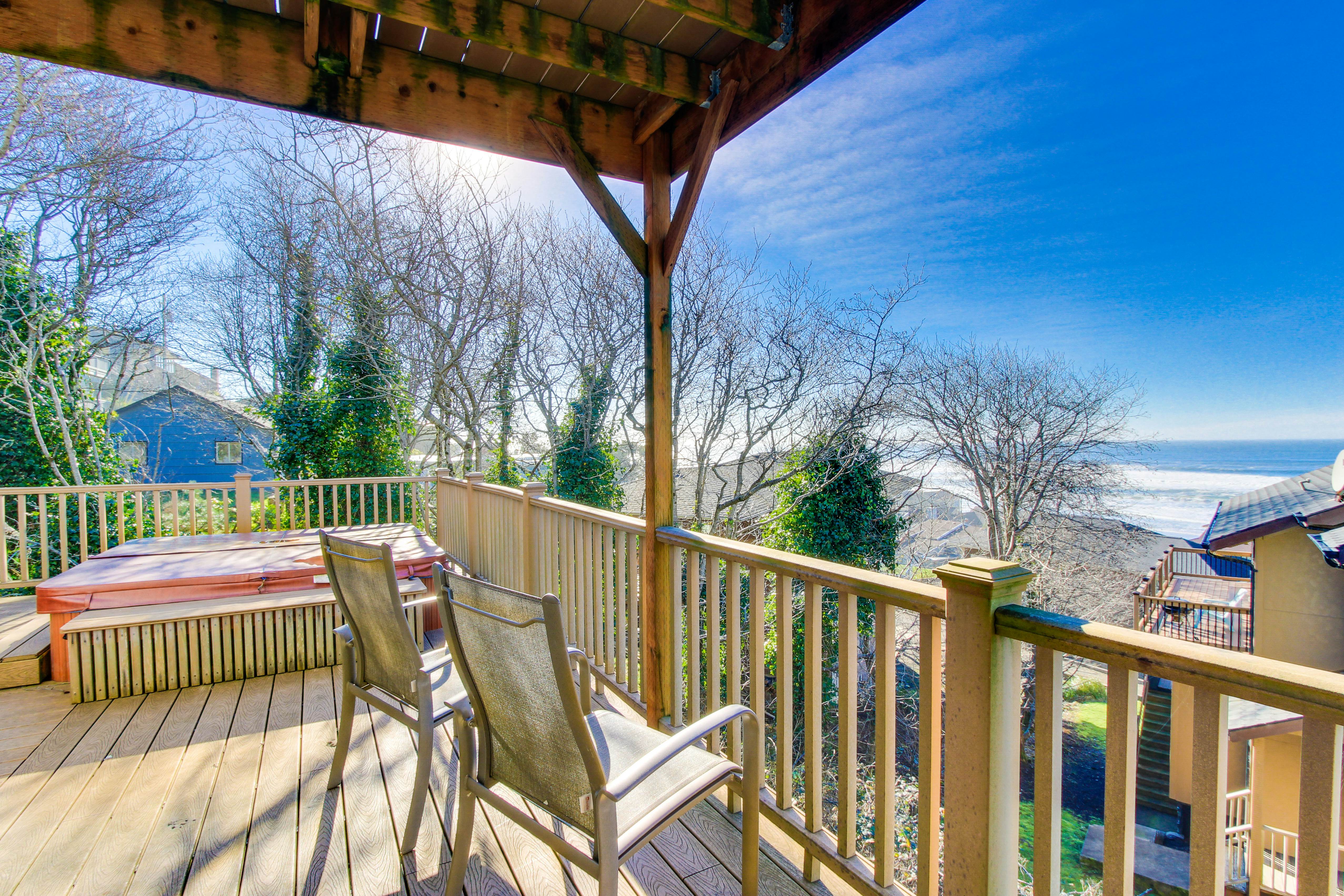 Sunlit home with gorgeous ocean views big decks and hot tub