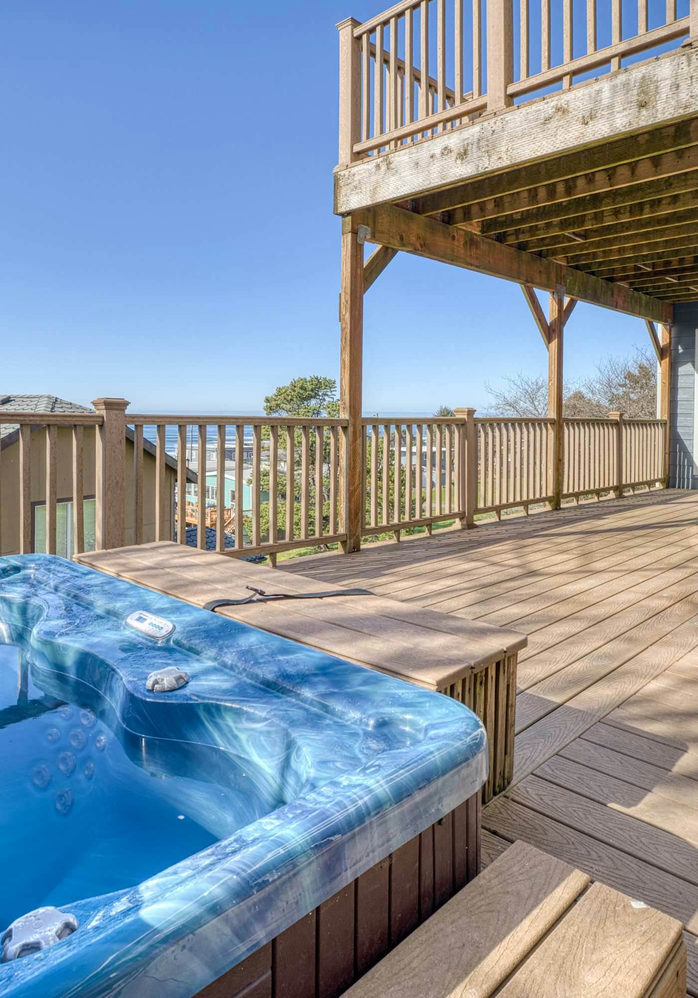 Sunlit home with gorgeous ocean views big decks and hot tub