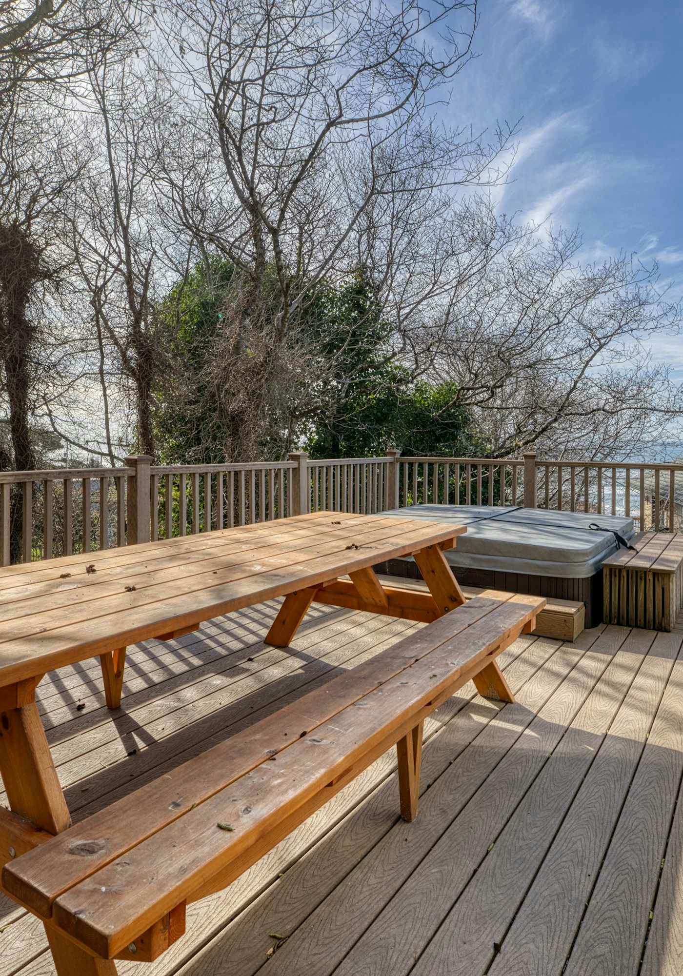Sunlit home with gorgeous ocean views big decks and hot tub