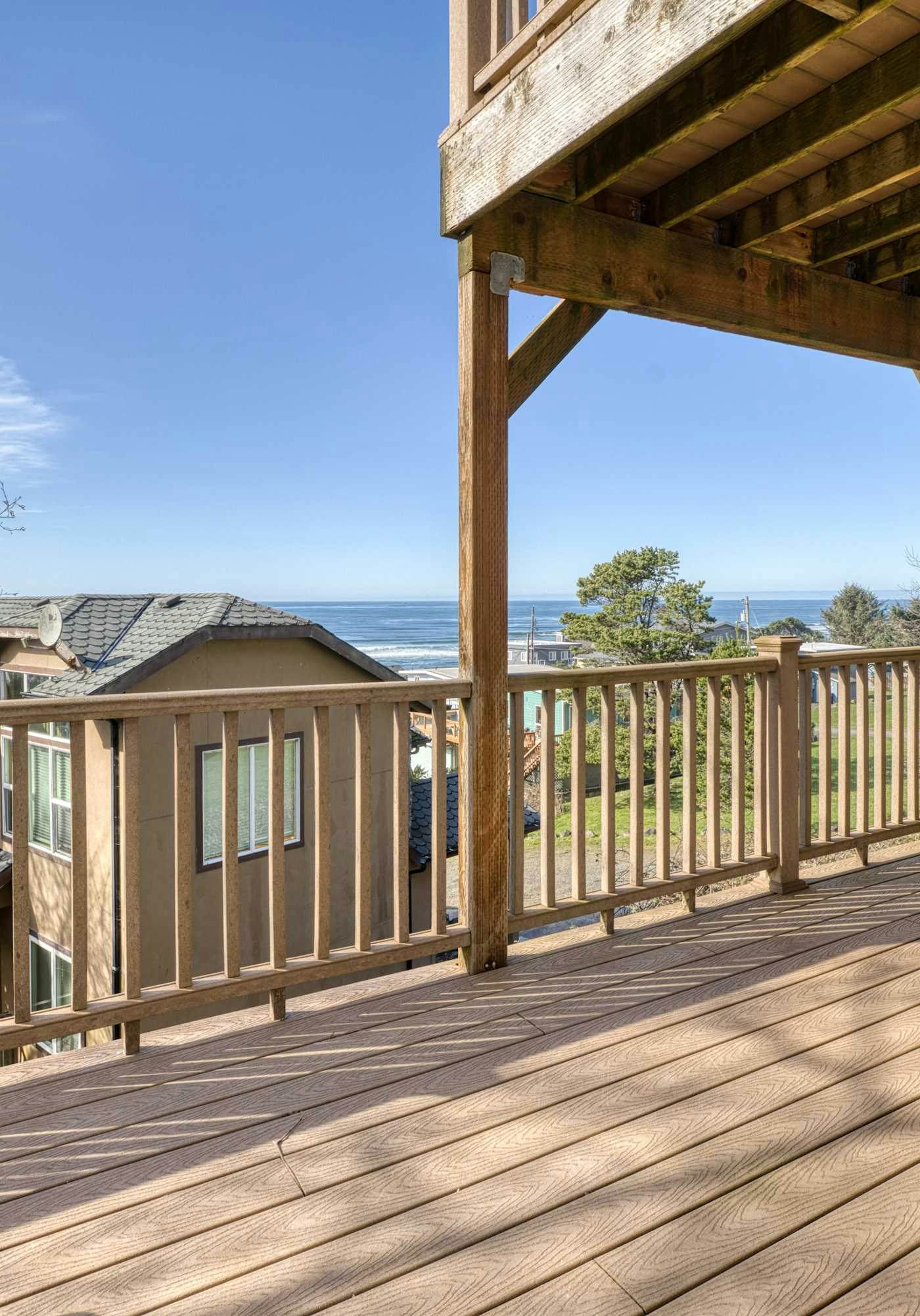 Sunlit home with gorgeous ocean views big decks and hot tub