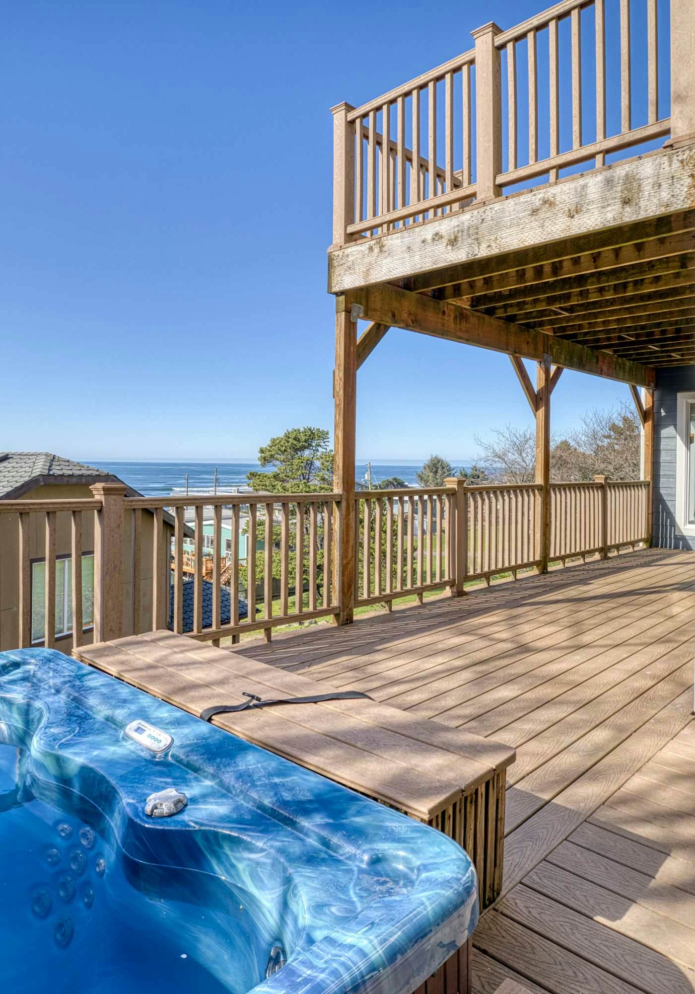 Sunlit home with gorgeous ocean views big decks and hot tub