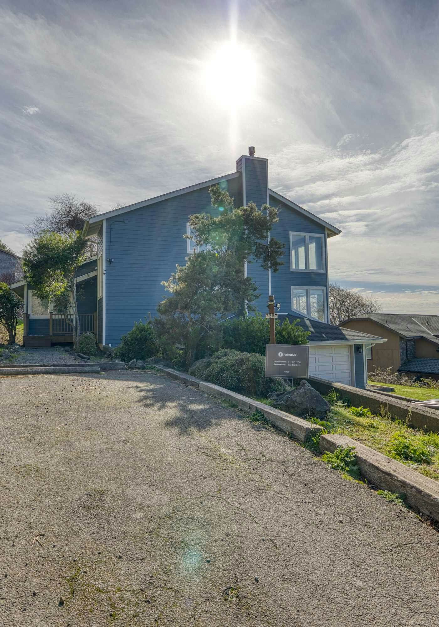 Sunlit home with gorgeous ocean views big decks and hot tub