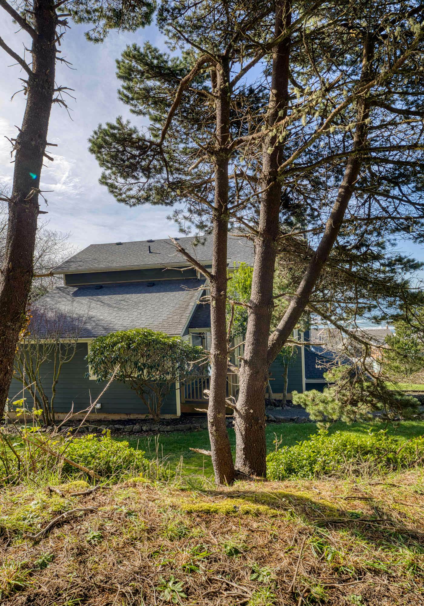 Sunlit home with gorgeous ocean views big decks and hot tub