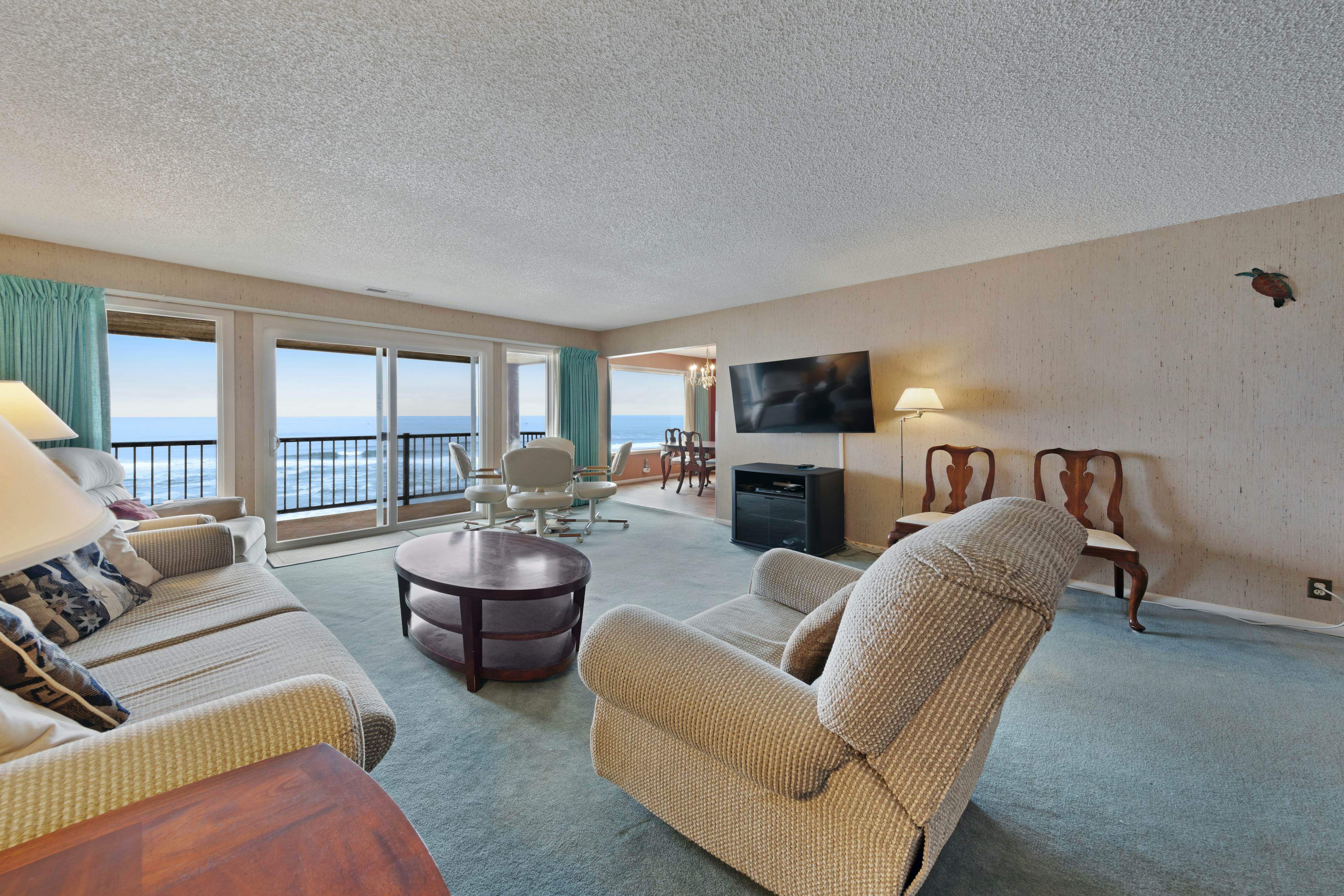 Lovely oceanfront condo with sweeping water views, & balcony