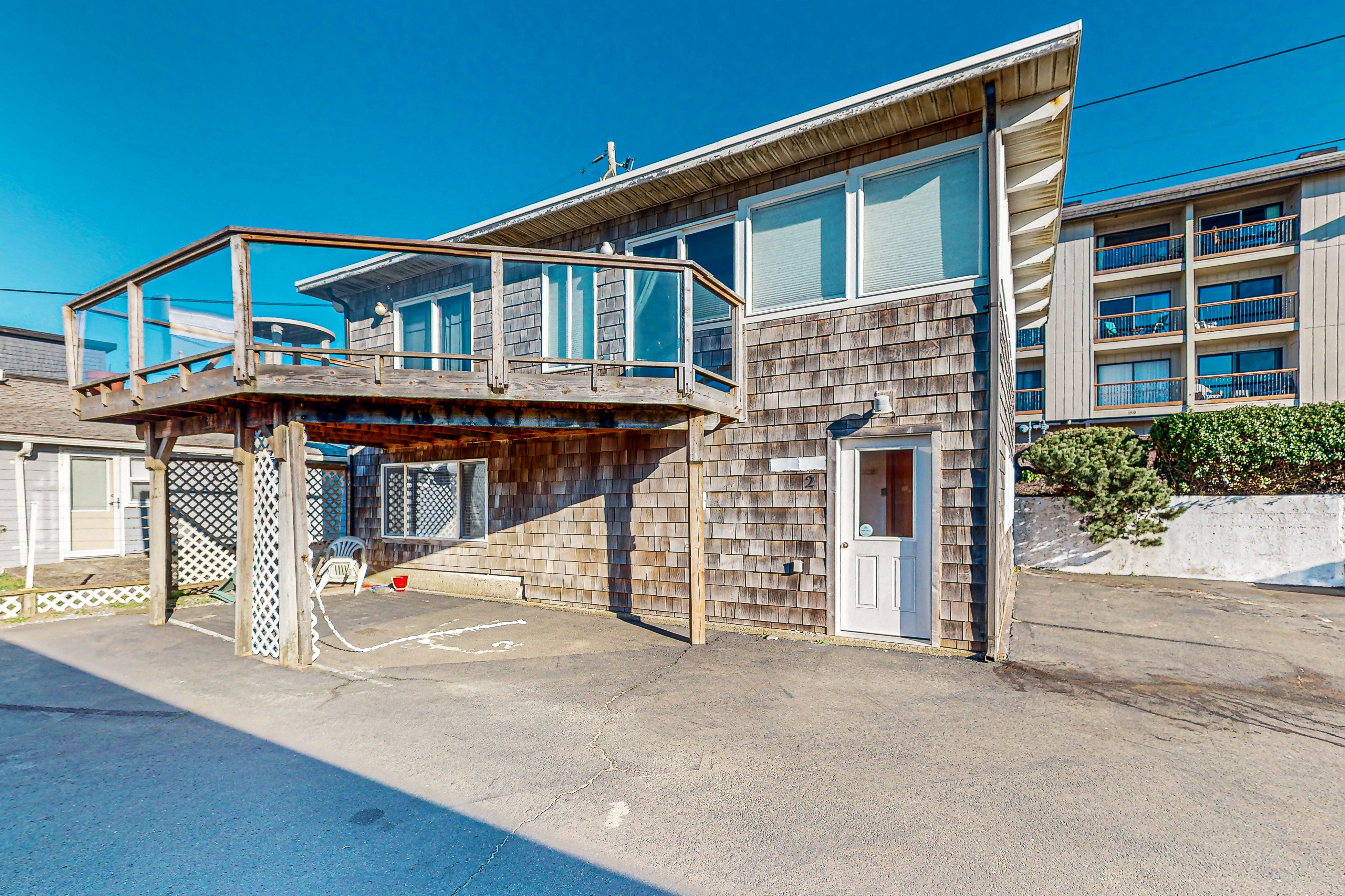 Comfortable Condo with Peek A Boo Ocean Views and Immediate Beach Access