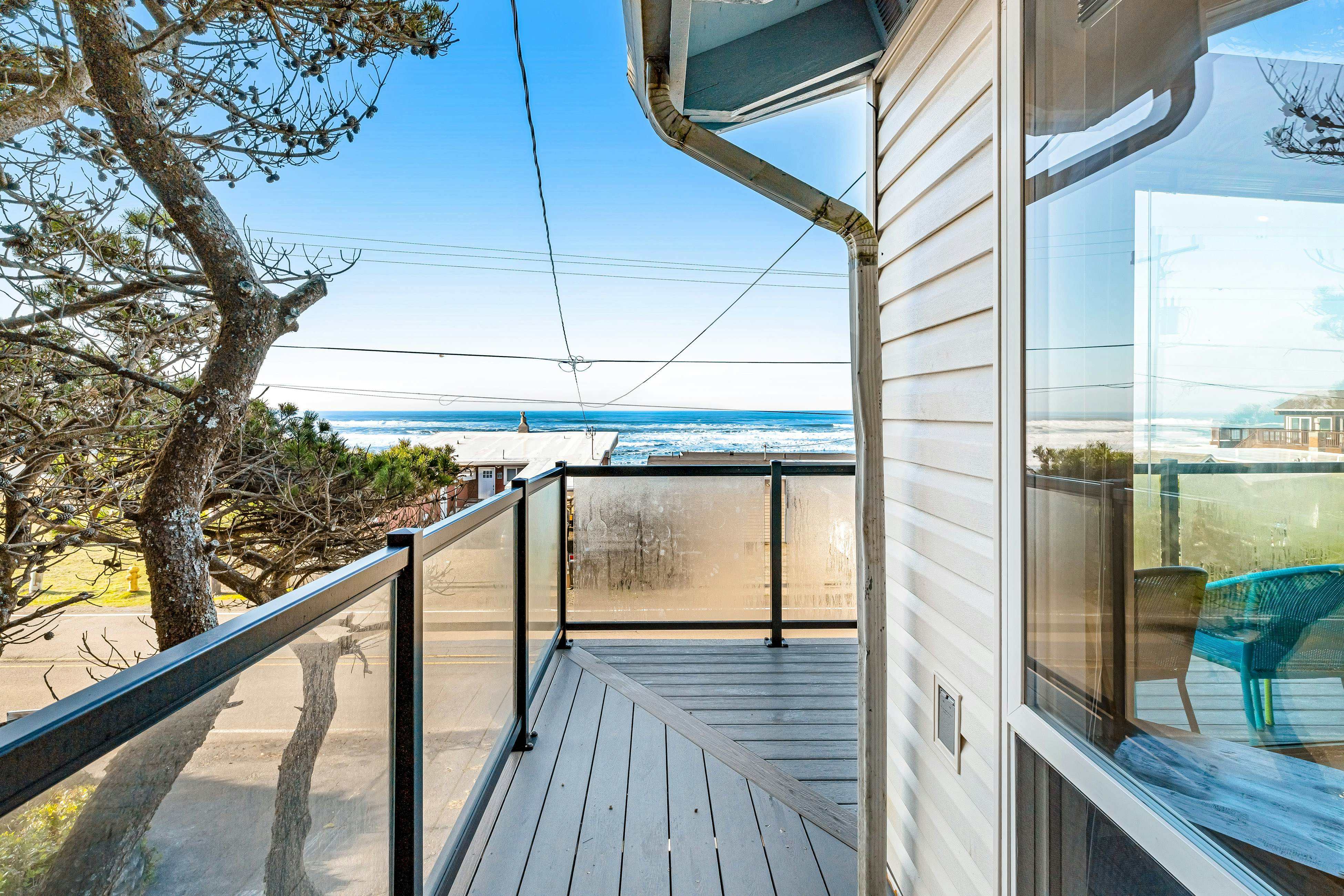 Bright home with stunning ocean views private hot tub and nearby beach access