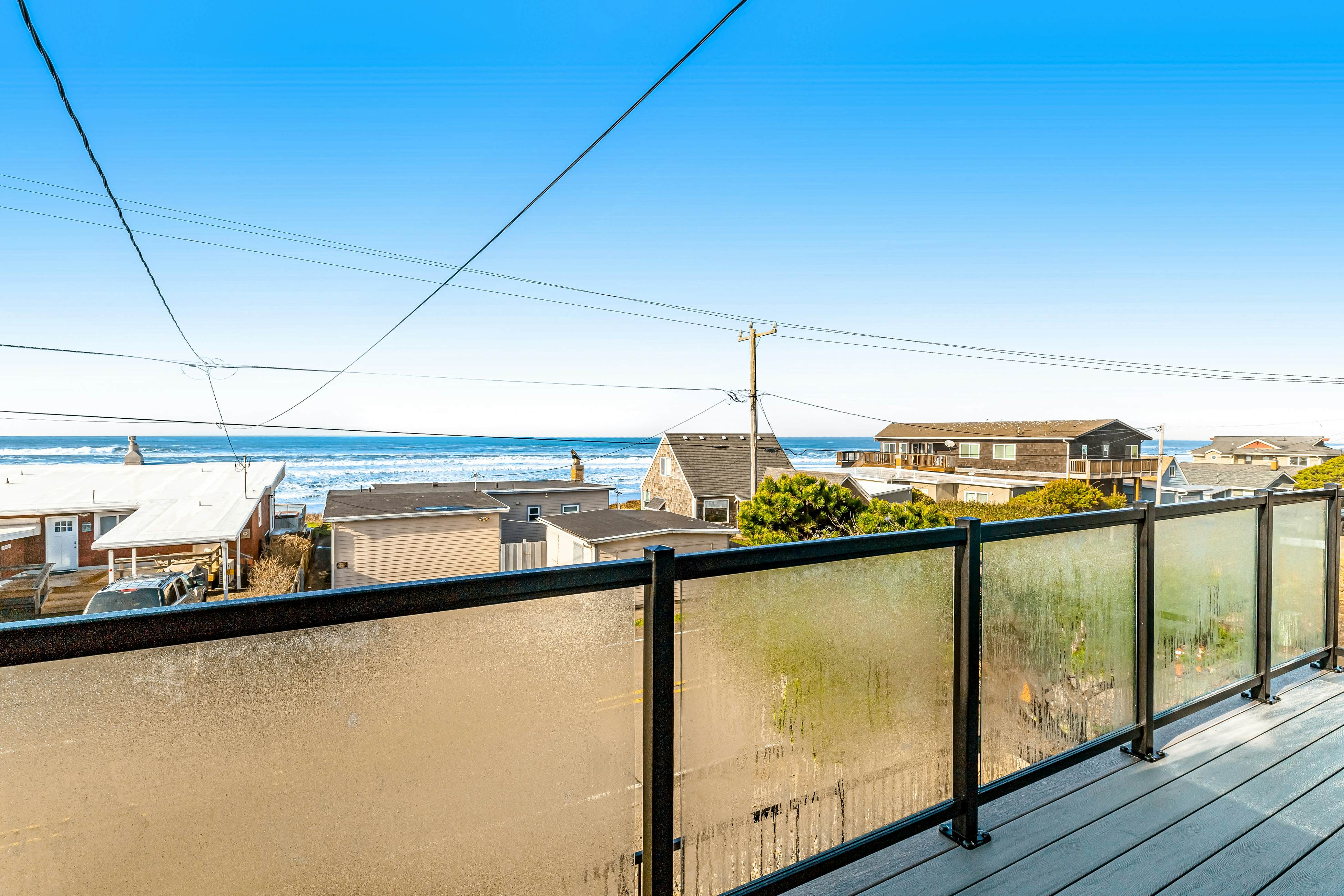 Bright home with stunning ocean views private hot tub and nearby beach access