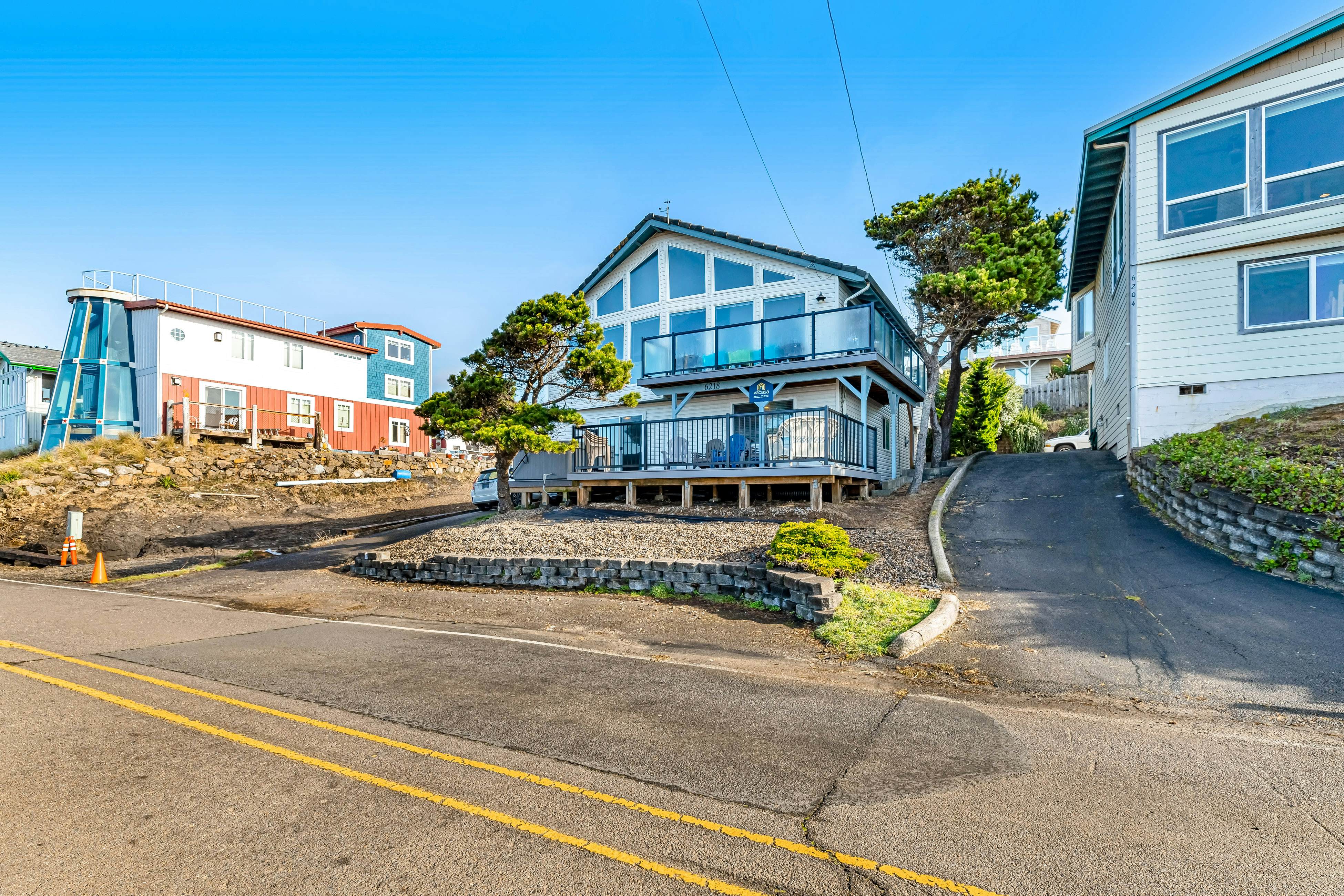 Bright home with stunning ocean views private hot tub and nearby beach access