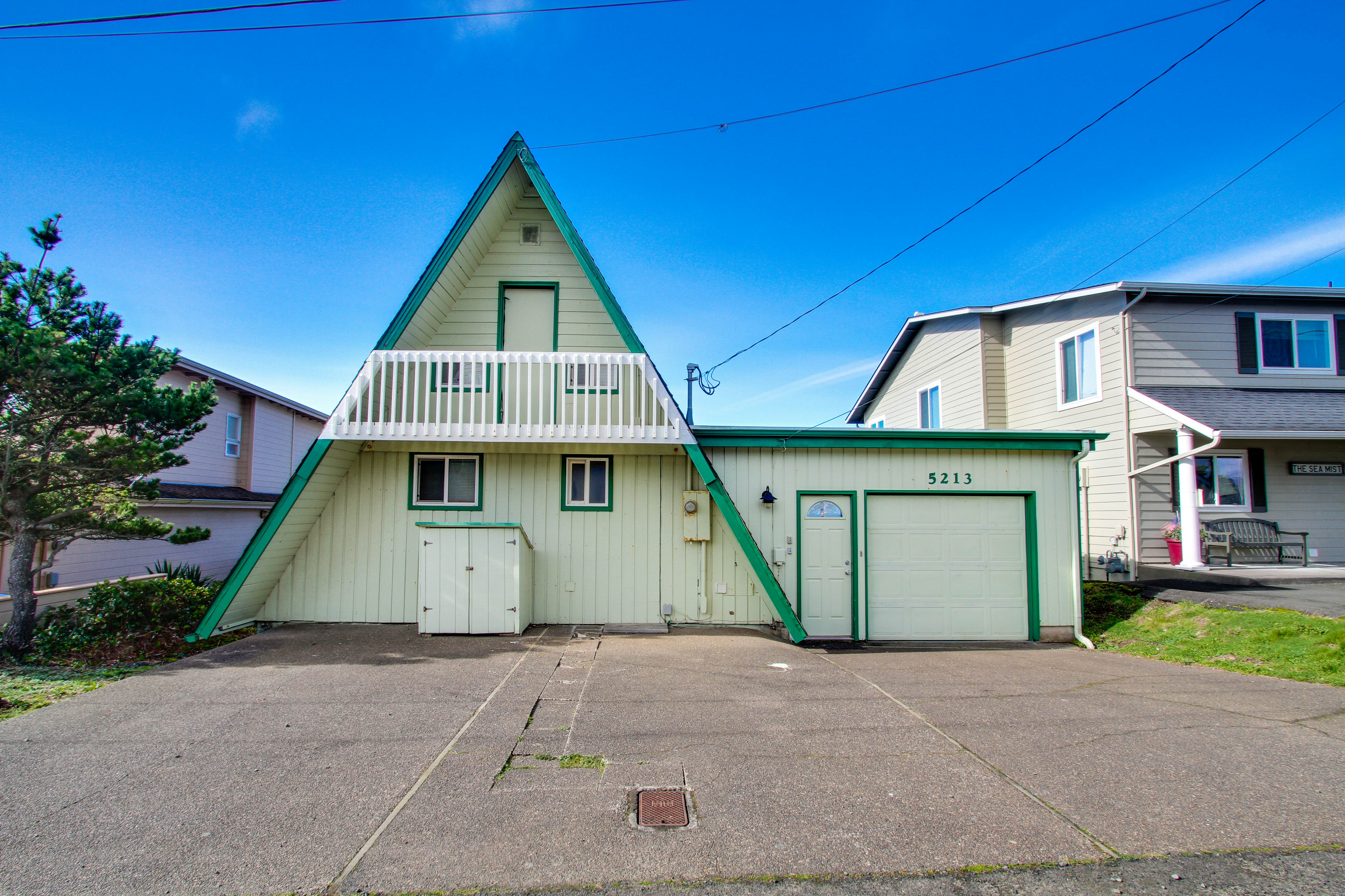 Dog-friendly A-frame cottage—oceanfront with ocean views & two blocks from beach