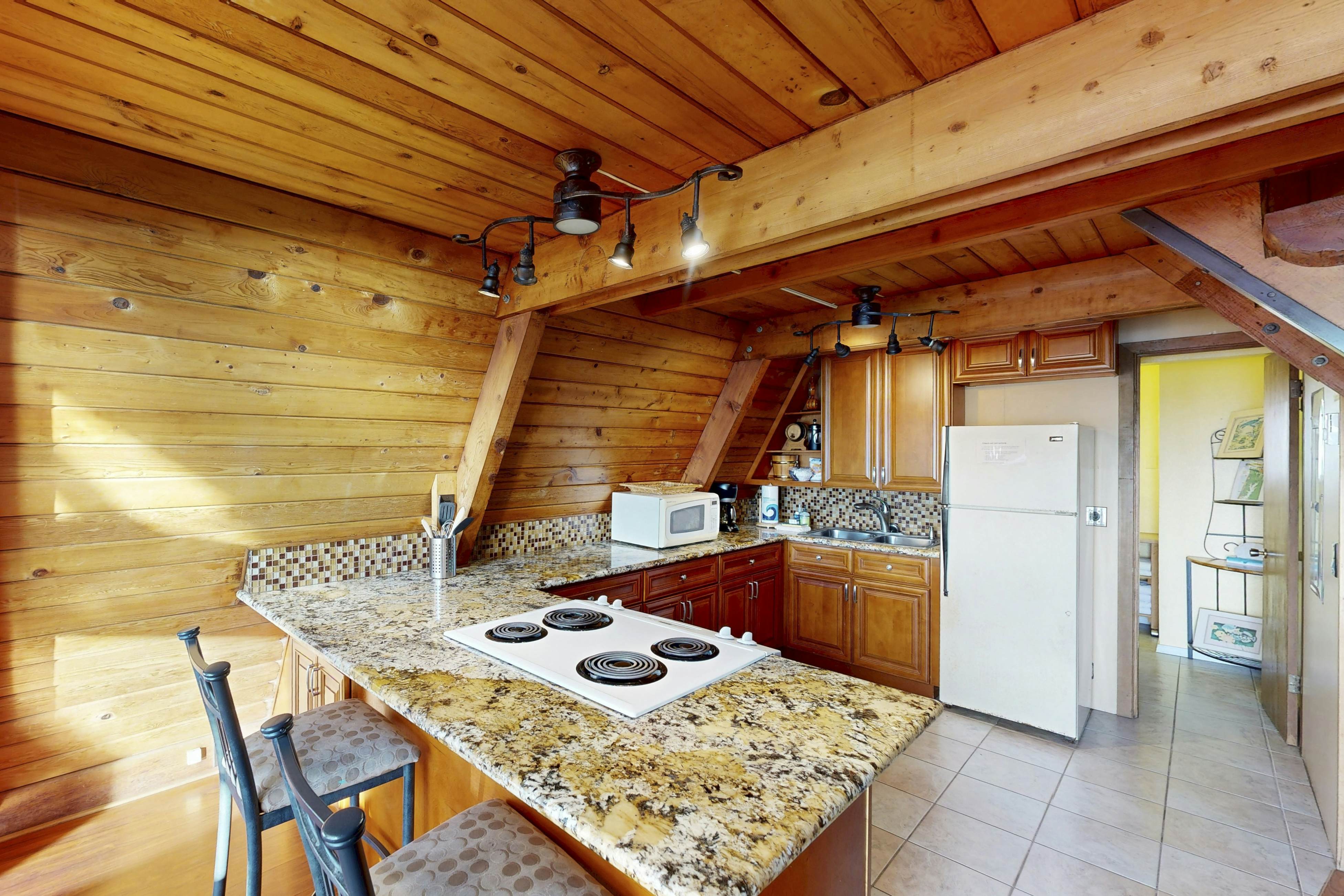 Dog-friendly A-frame cottage—oceanfront with ocean views & two blocks from beach