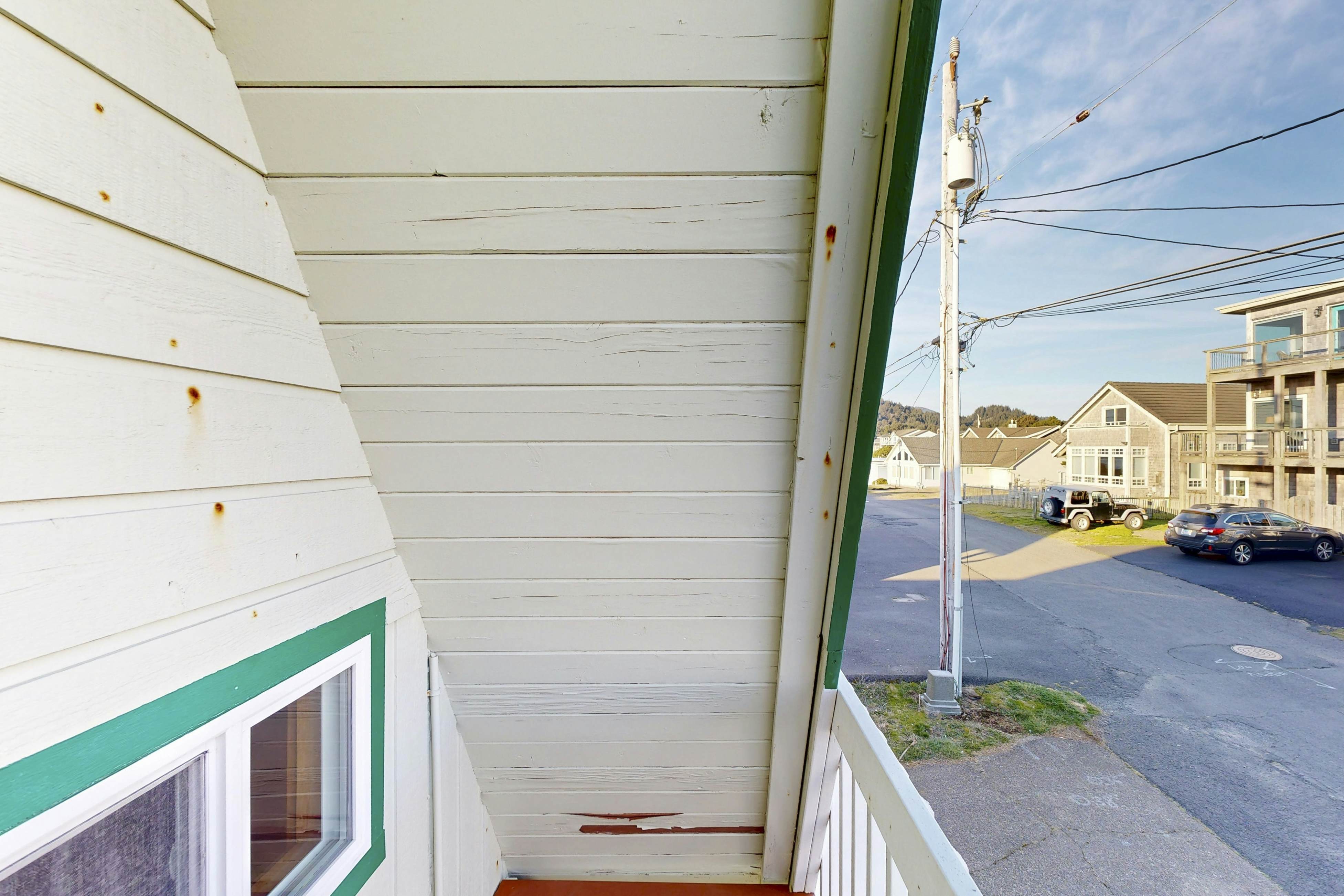 Dog-friendly A-frame cottage—oceanfront with ocean views & two blocks from beach