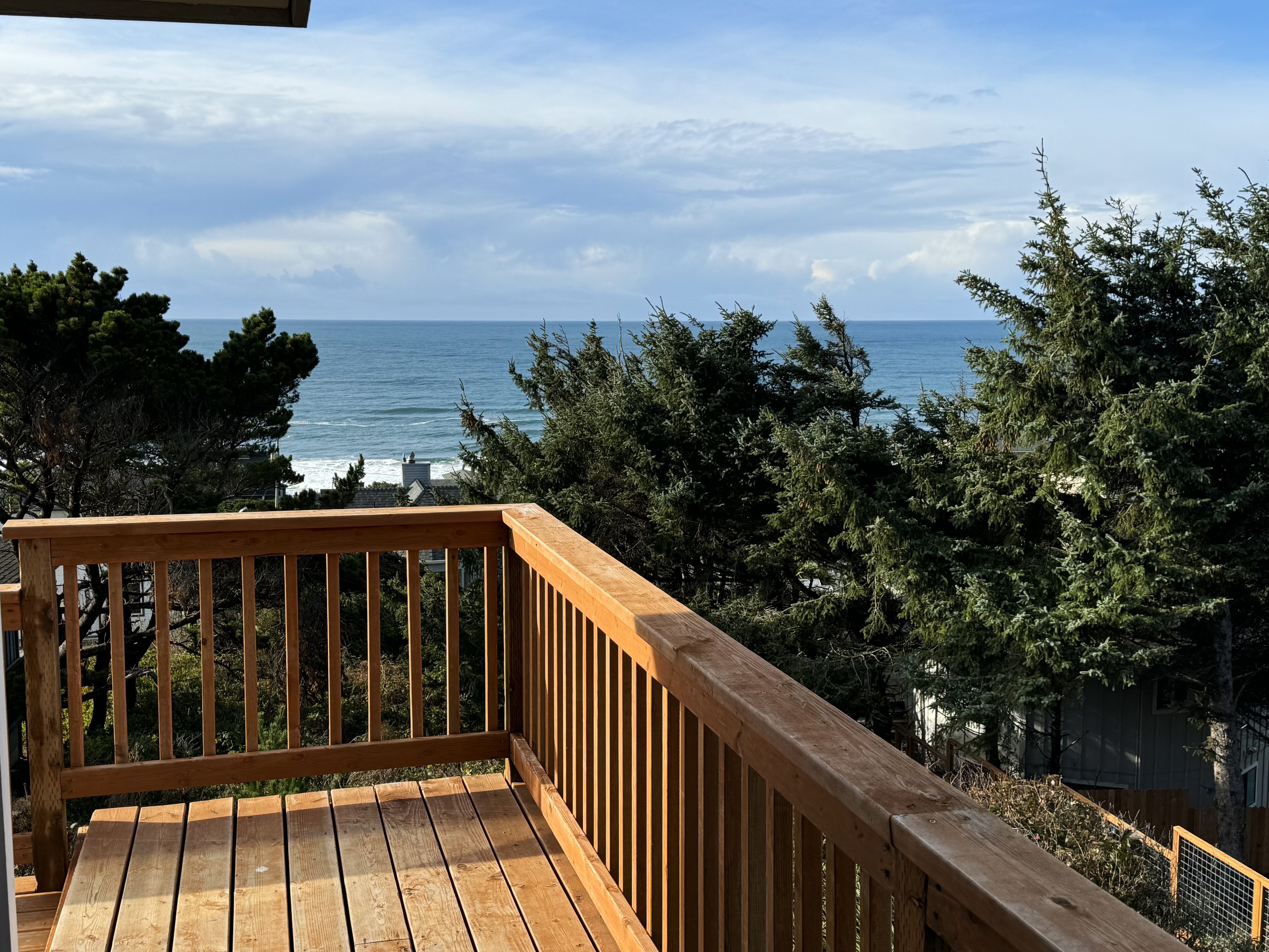 Cottage with wraparound deck and ocean views close to beach and town dog friendly