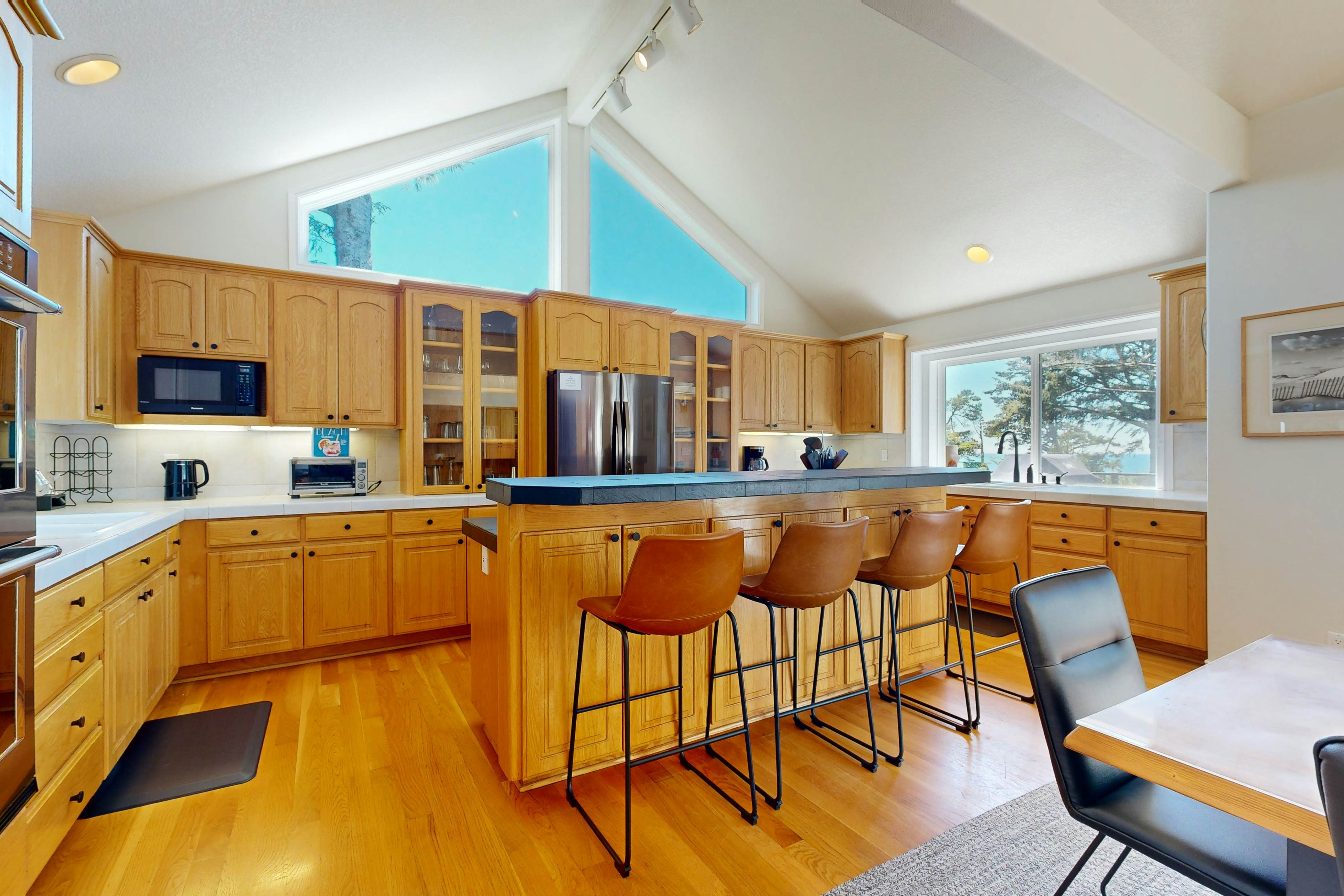 Idyllic Cape retreat with ocean views & private hot tub - walk to state beach
