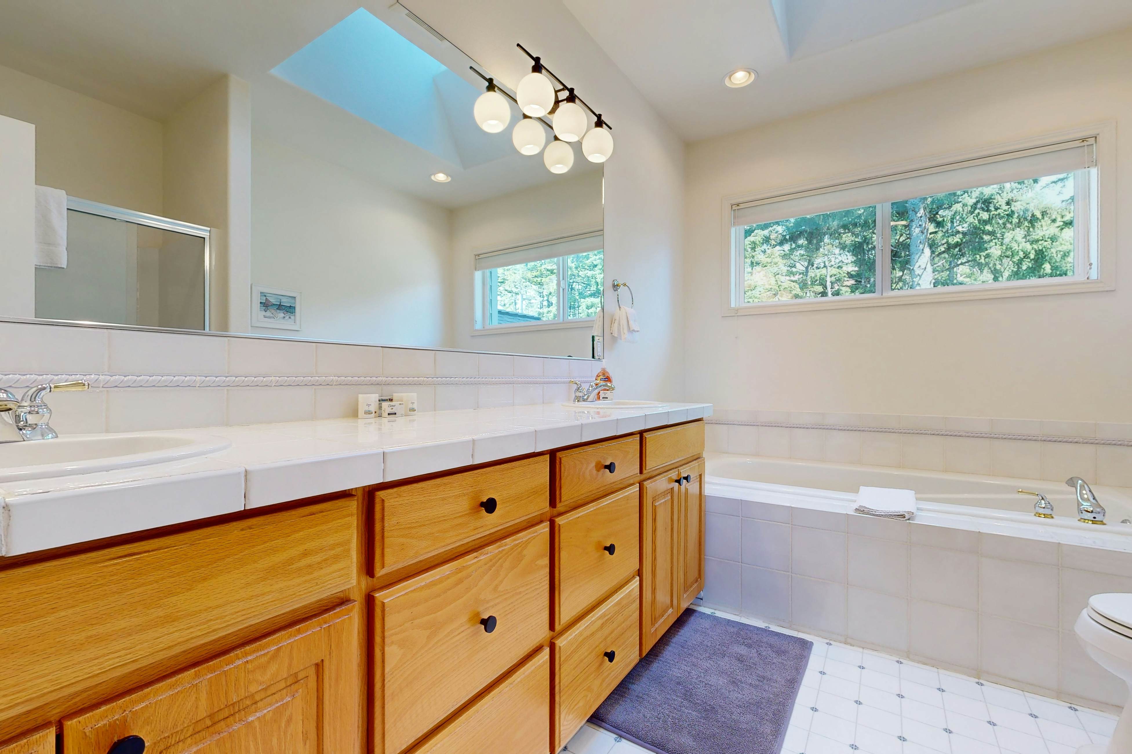 Idyllic Cape retreat with ocean views & private hot tub - walk to state beach