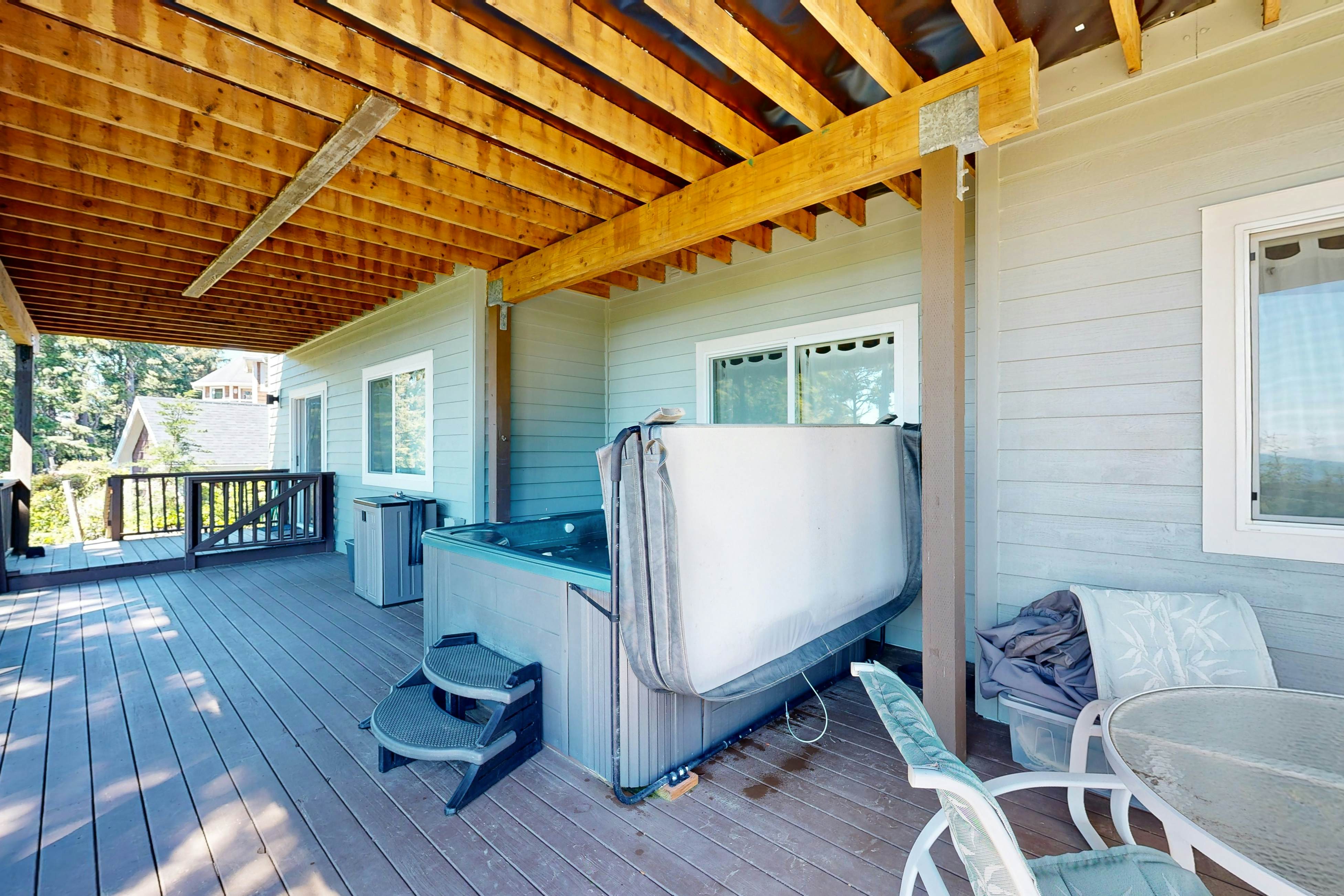 Idyllic Cape retreat with ocean views & private hot tub - walk to state beach