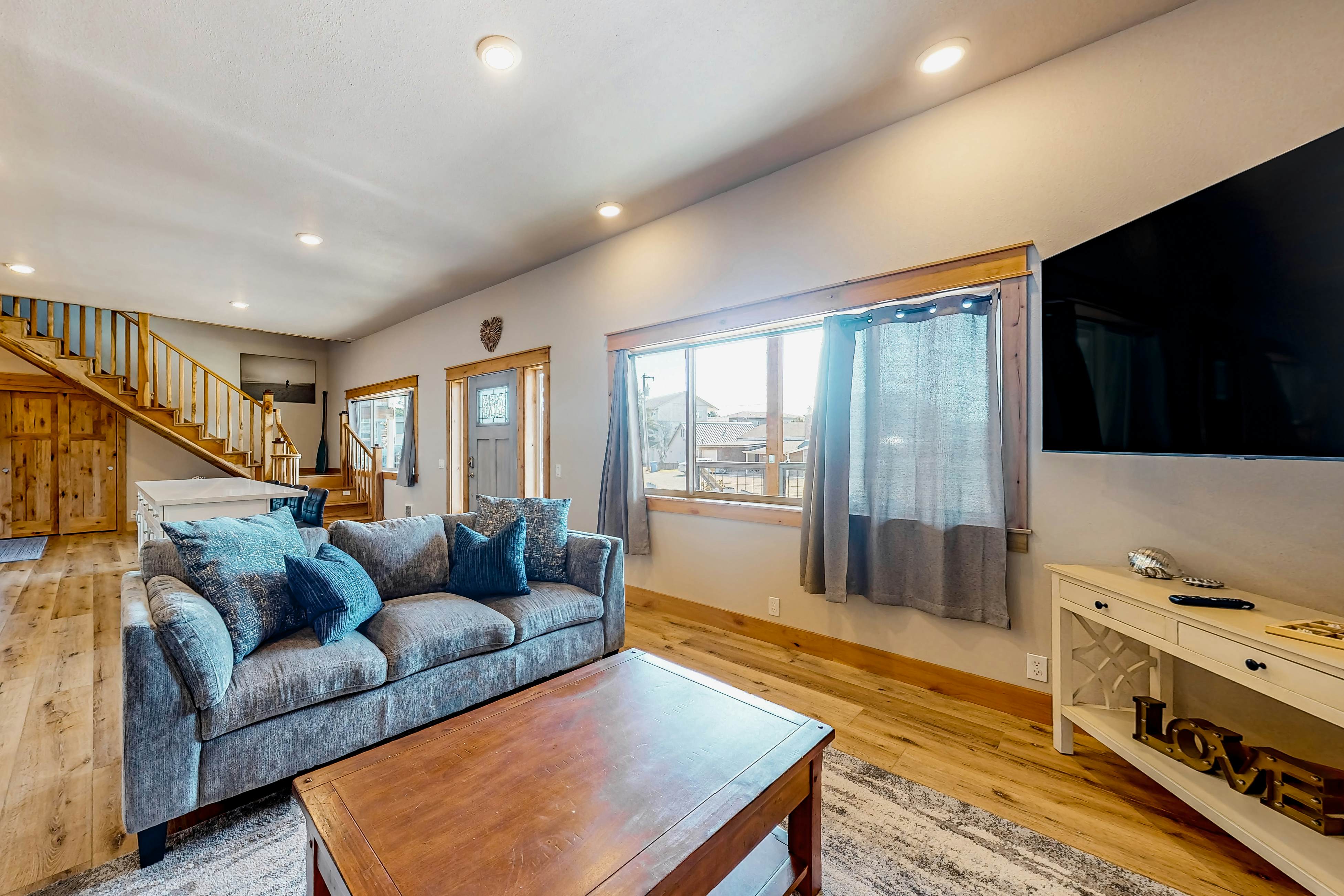 Costal Home a block from the beach with two-story deck, firepit, large yard