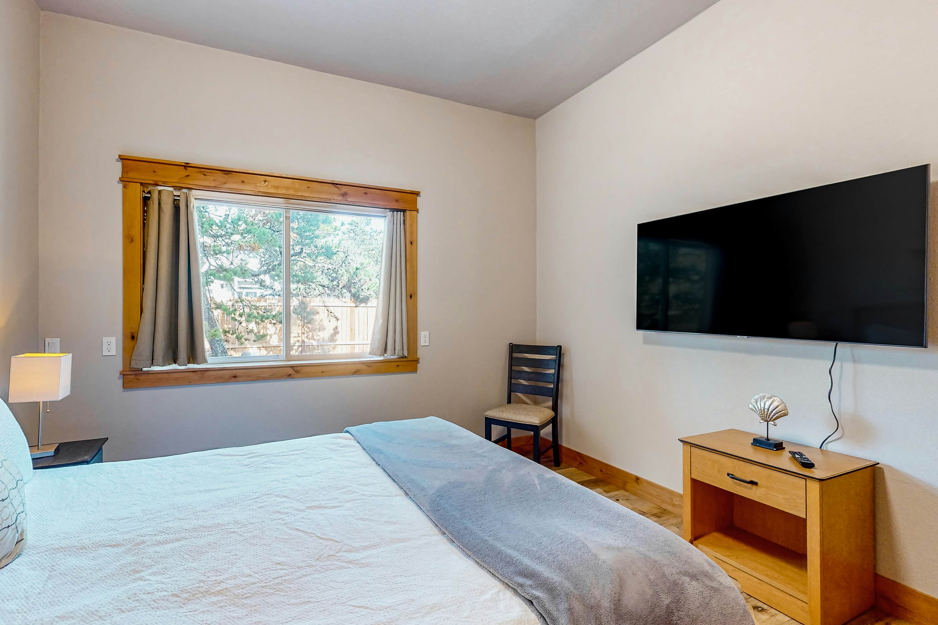 Costal Home a block from the beach with two-story deck, firepit, large yard