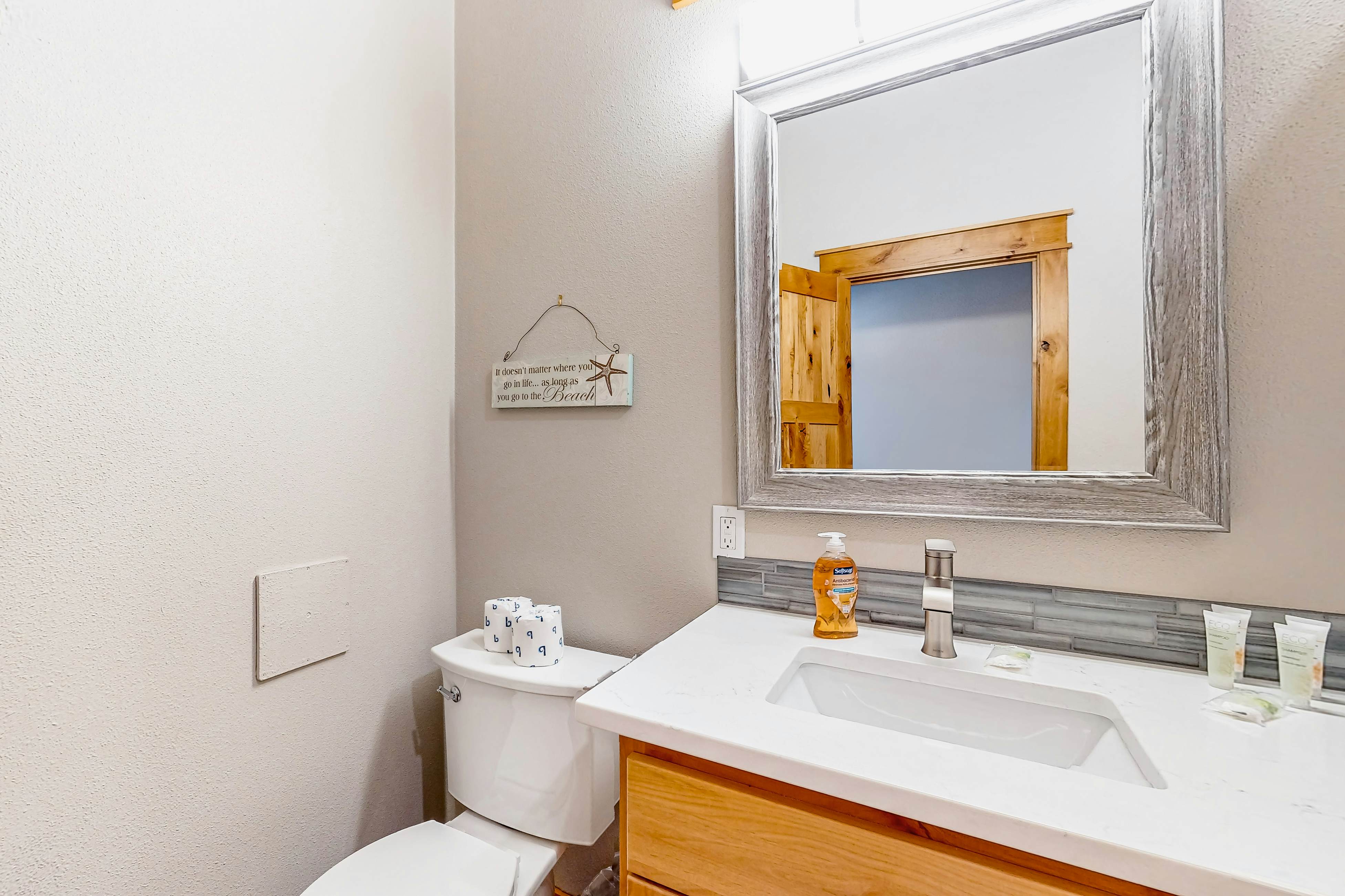 Costal Home a block from the beach with two-story deck, firepit, large yard