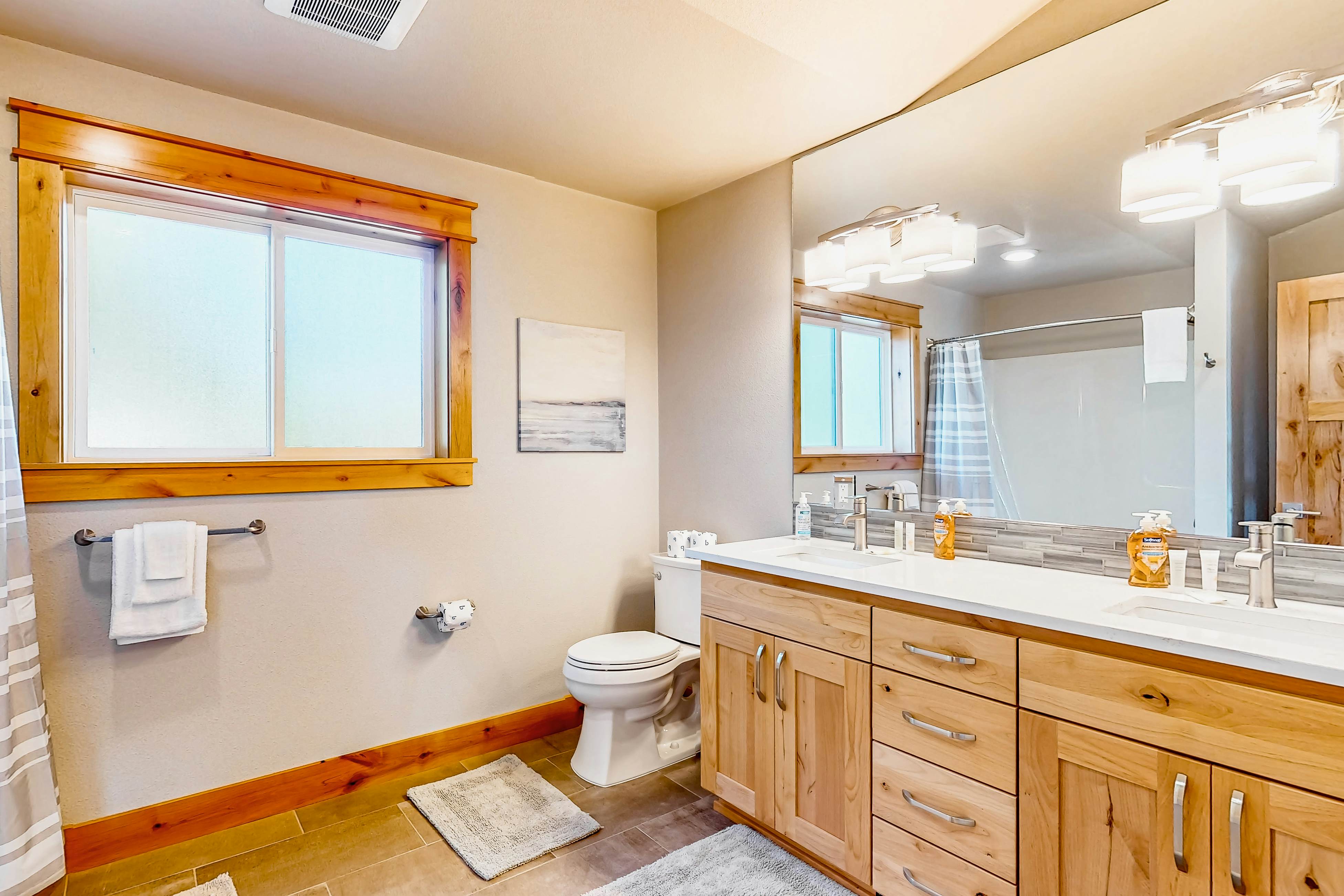 Costal Home a block from the beach with two-story deck, firepit, large yard