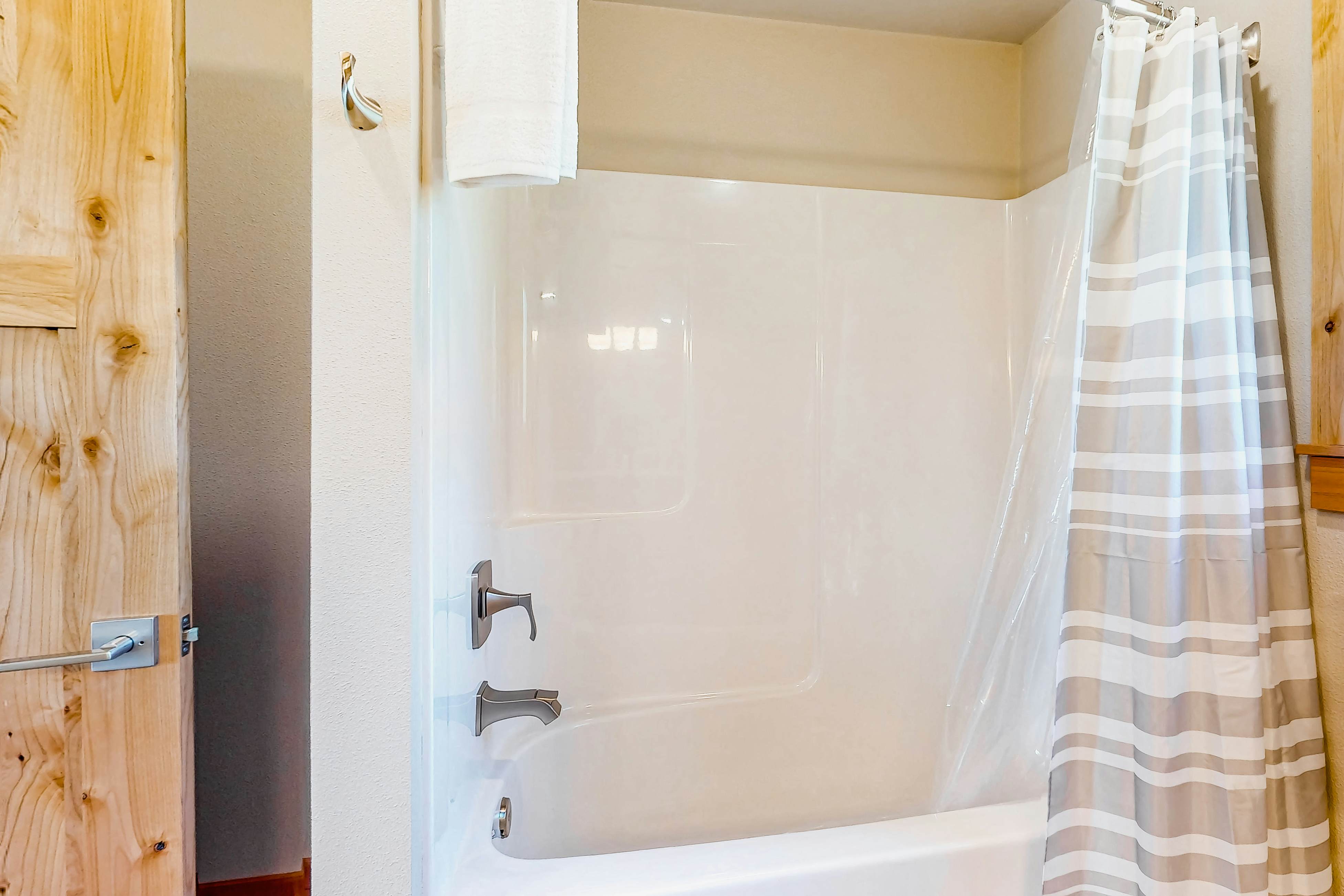 Costal Home a block from the beach with two-story deck, firepit, large yard