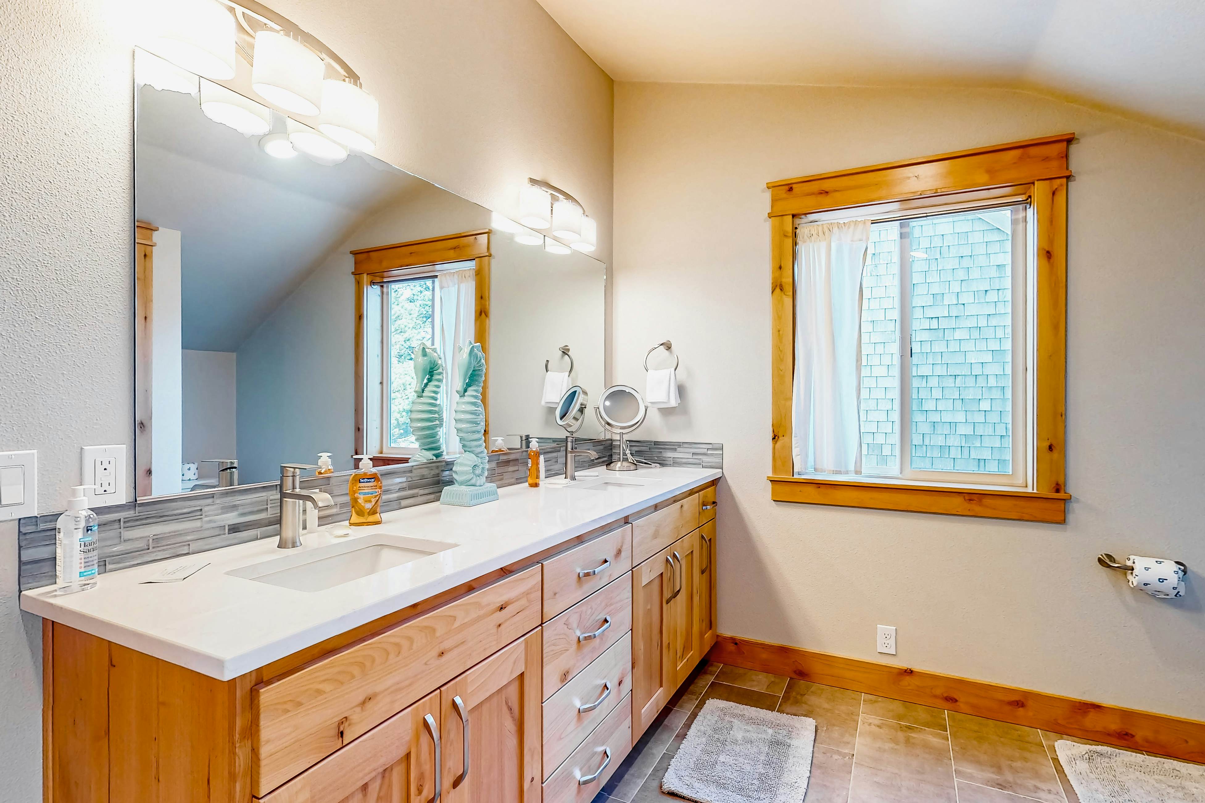 Costal Home a block from the beach with two-story deck, firepit, large yard