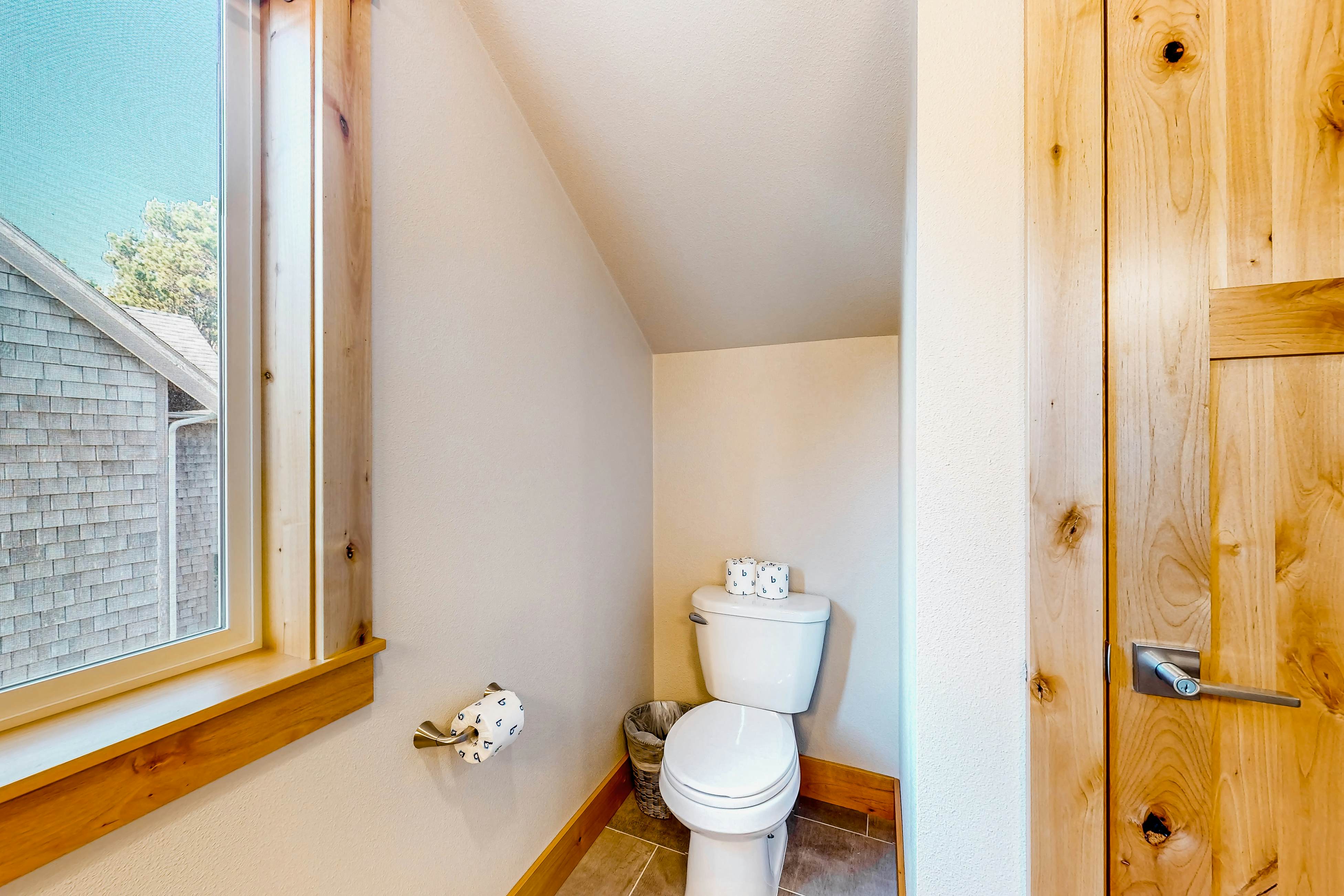 Costal Home a block from the beach with two-story deck, firepit, large yard