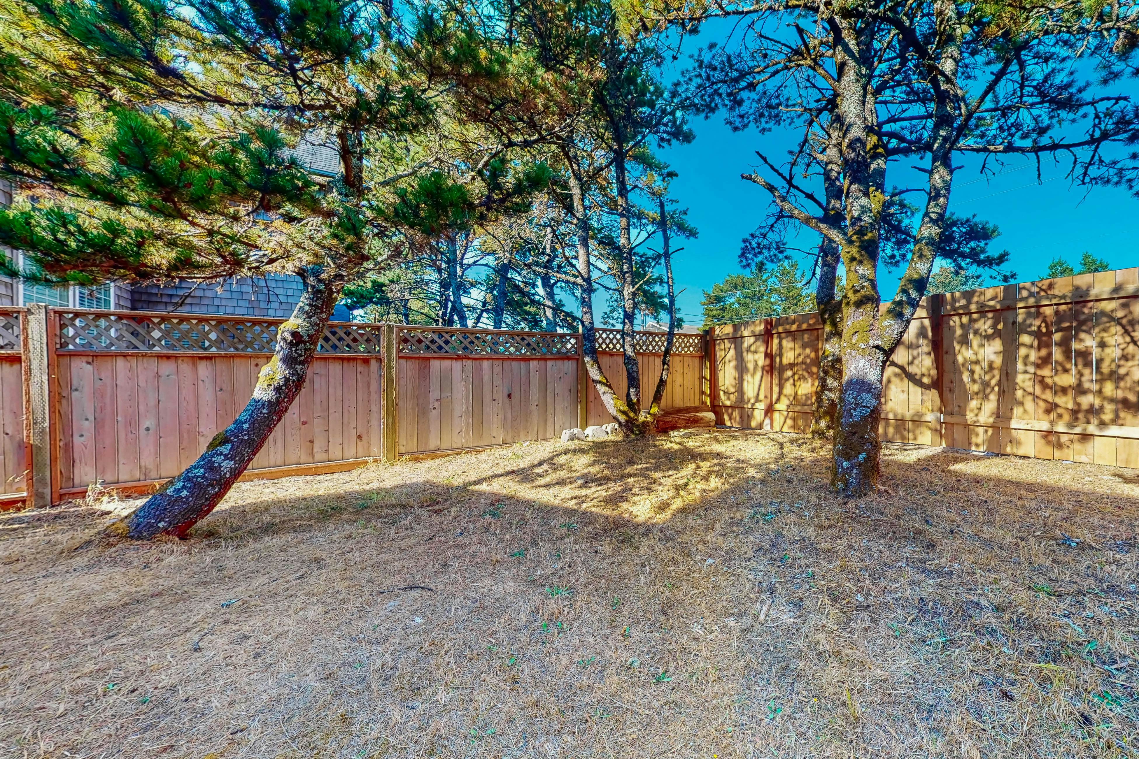 Costal Home a block from the beach with two-story deck, firepit, large yard