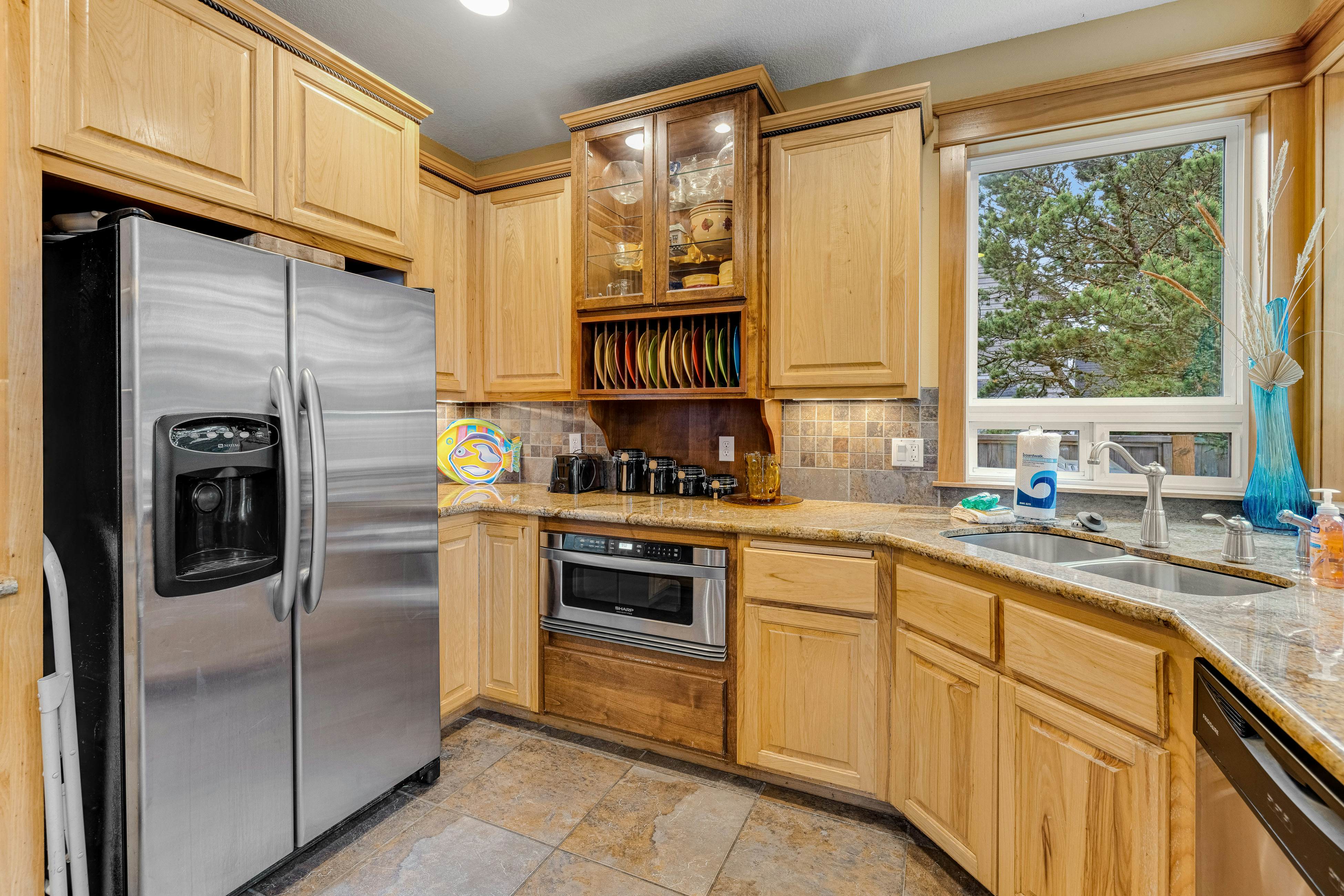 Dog-friendly coastal retreat with a game room, patio, grill, jetted tub, & W/D