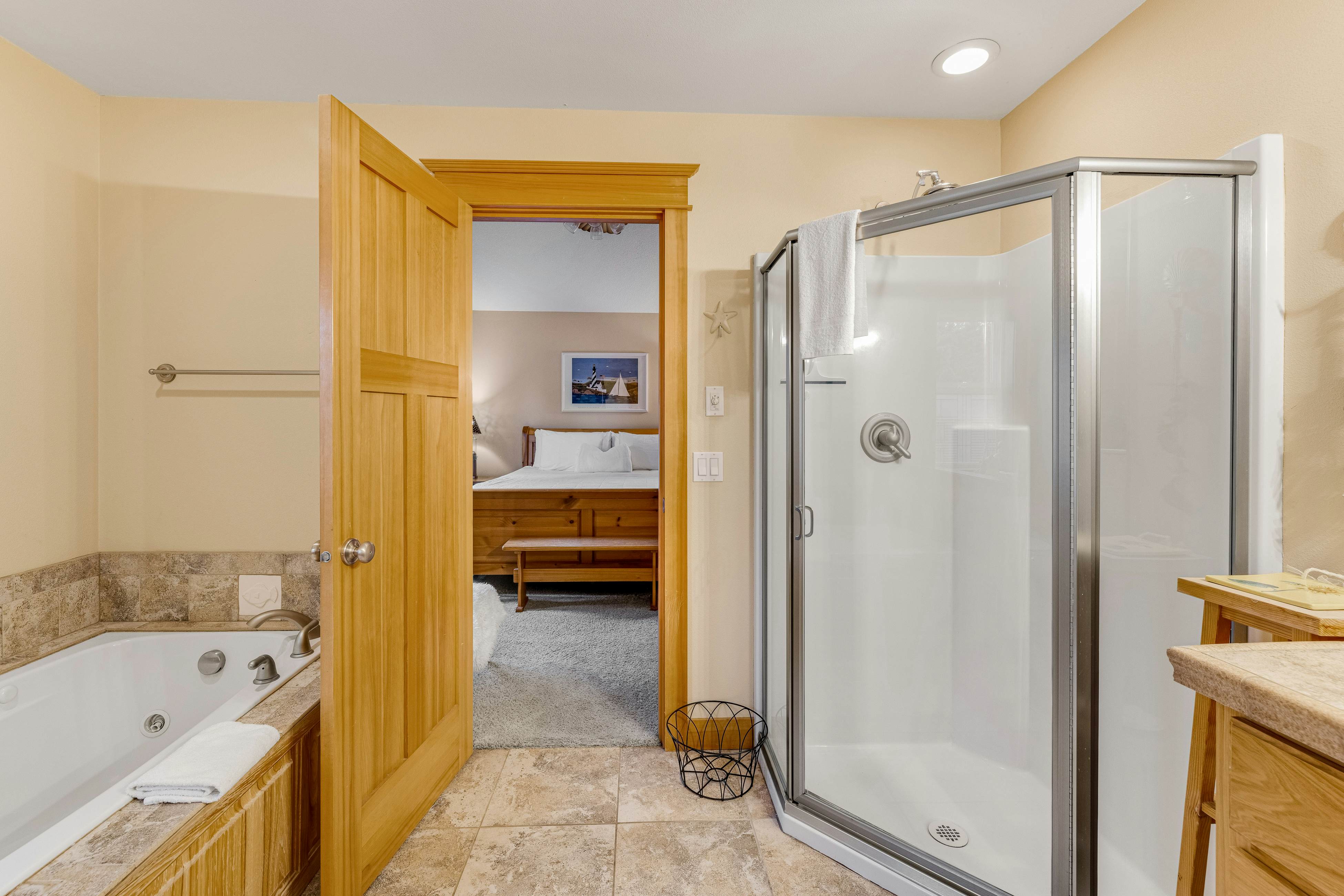 Dog-friendly coastal retreat with a game room, patio, grill, jetted tub, & W/D