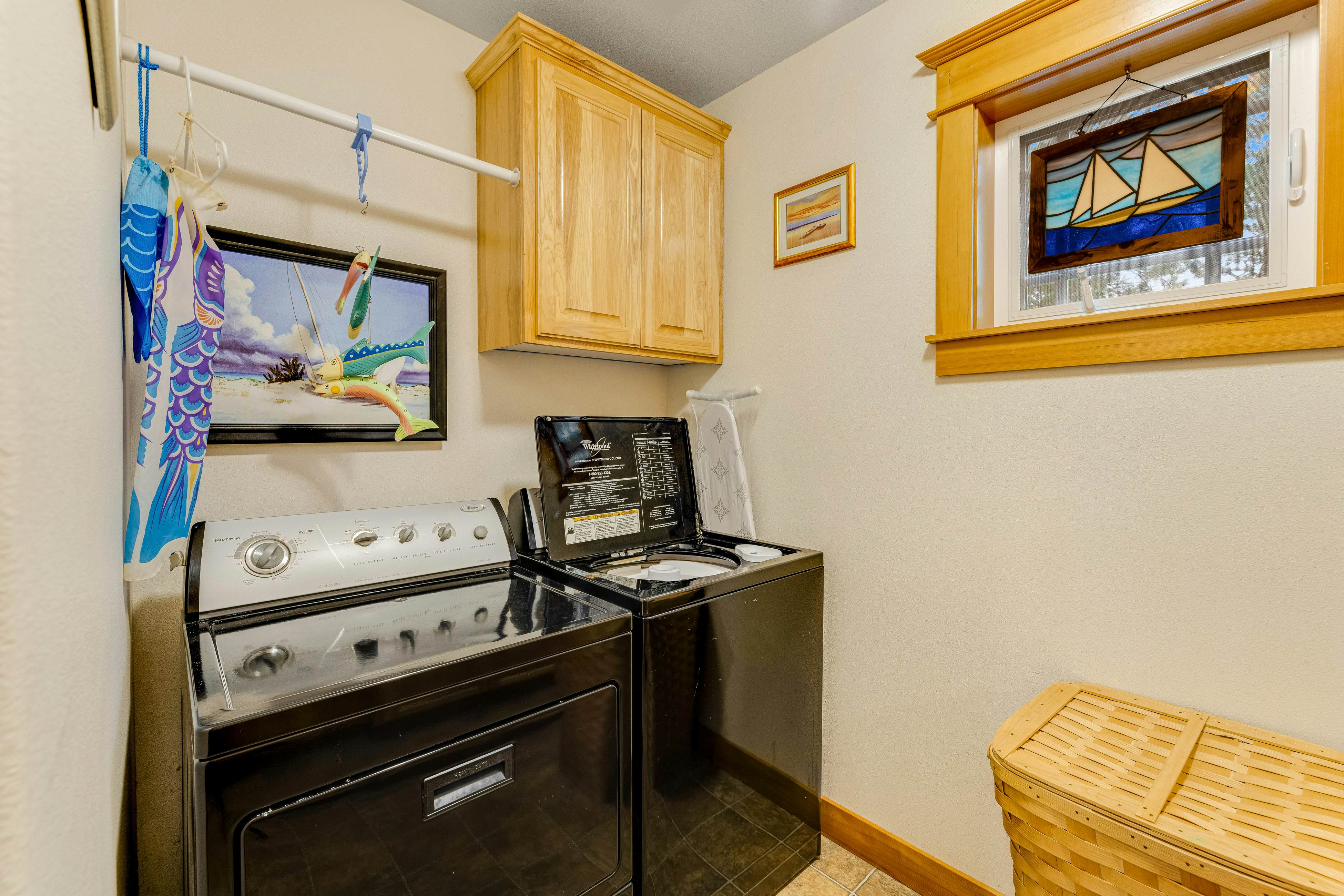 Dog-friendly coastal retreat with a game room, patio, grill, jetted tub, & W/D