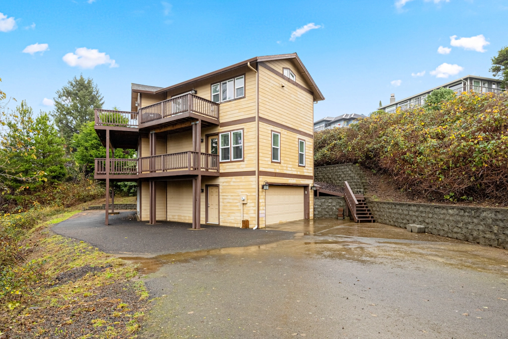 Three story ocean view home with balconies grill and open layout dog friendly