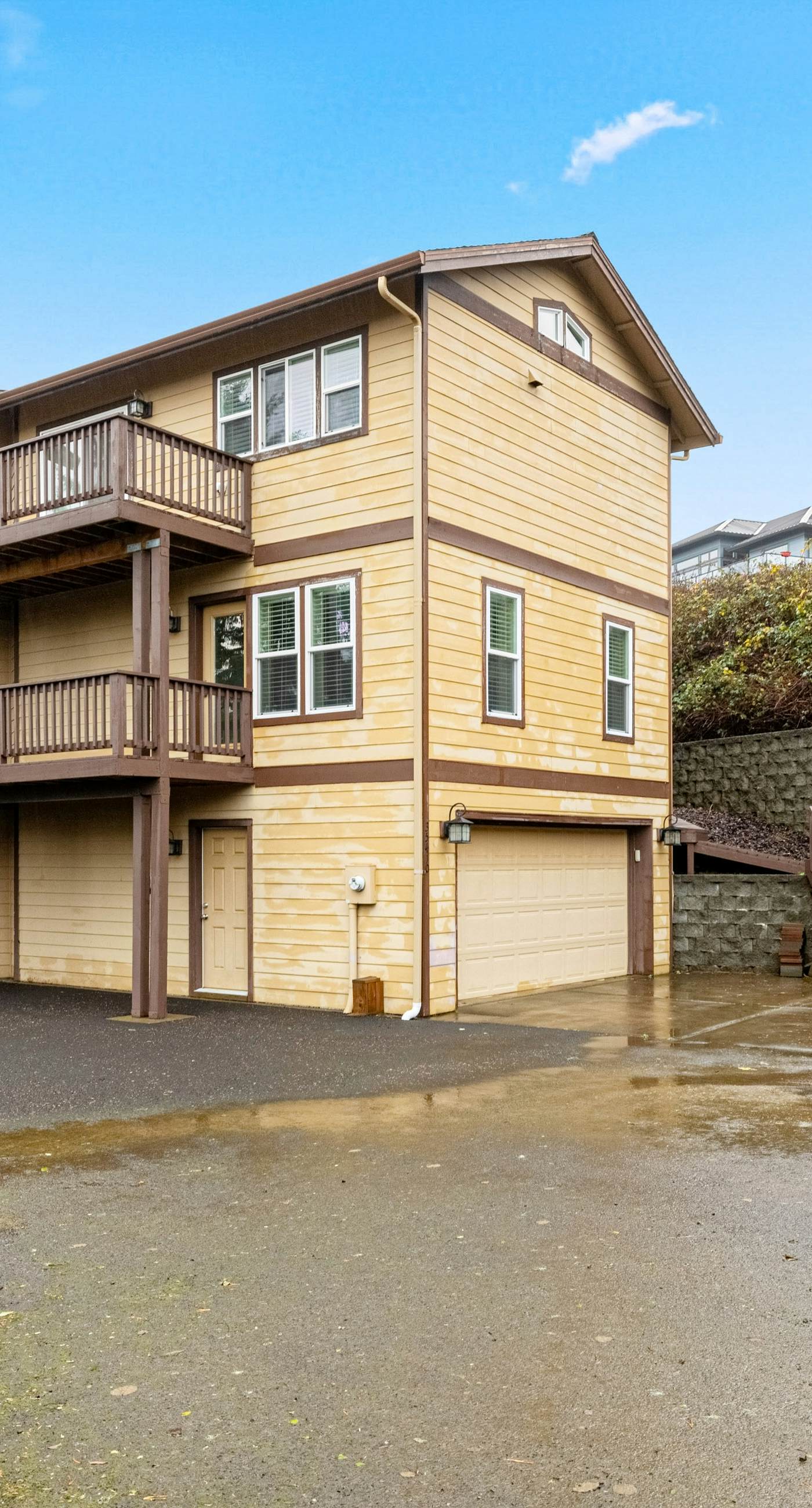 Three story ocean view home with balconies grill and open layout dog friendly