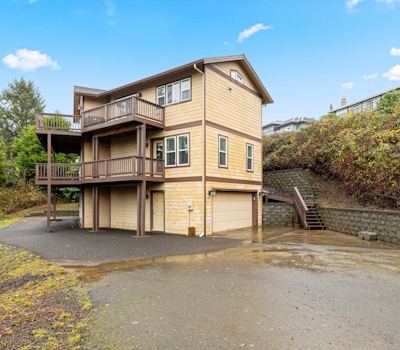 Three story ocean view home with balconies grill and open layout dog friendly