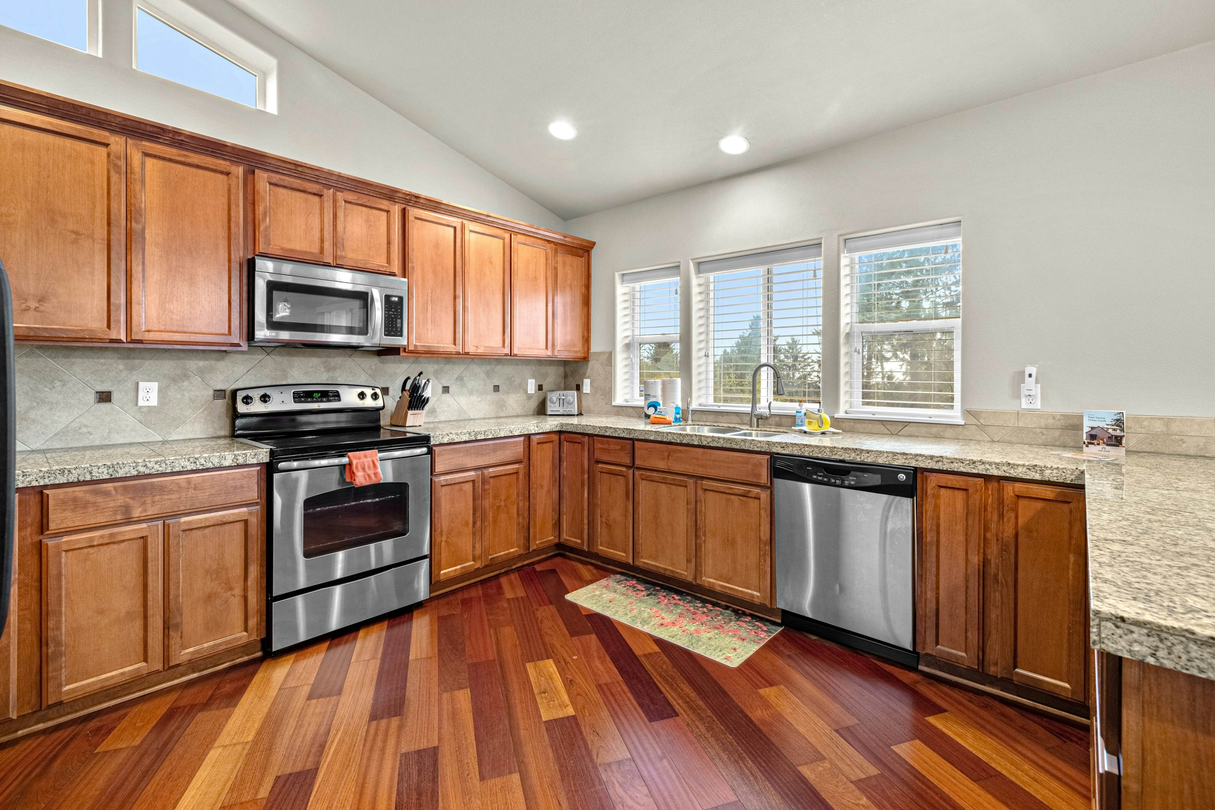 Three-story ocean view home with balconies, grill, & open layout - dog-friendly