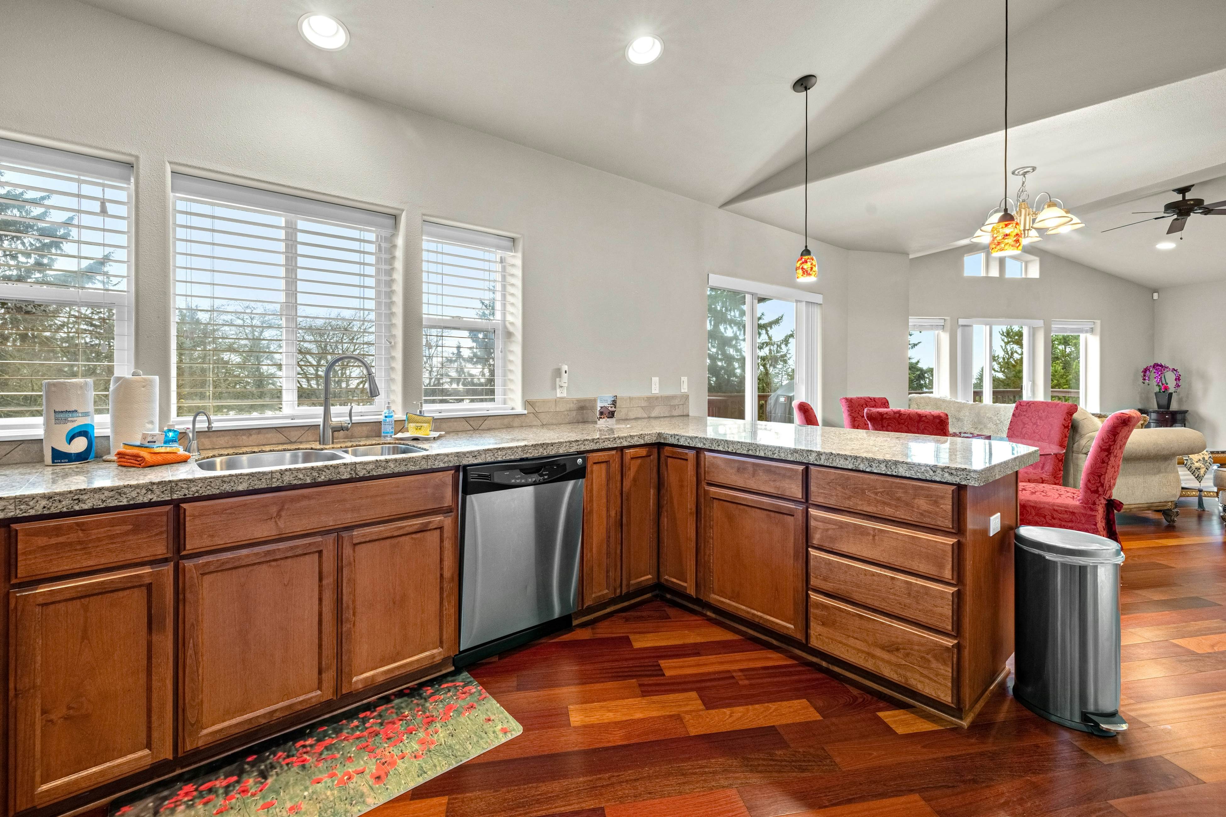 Three-story ocean view home with balconies, grill, & open layout - dog-friendly