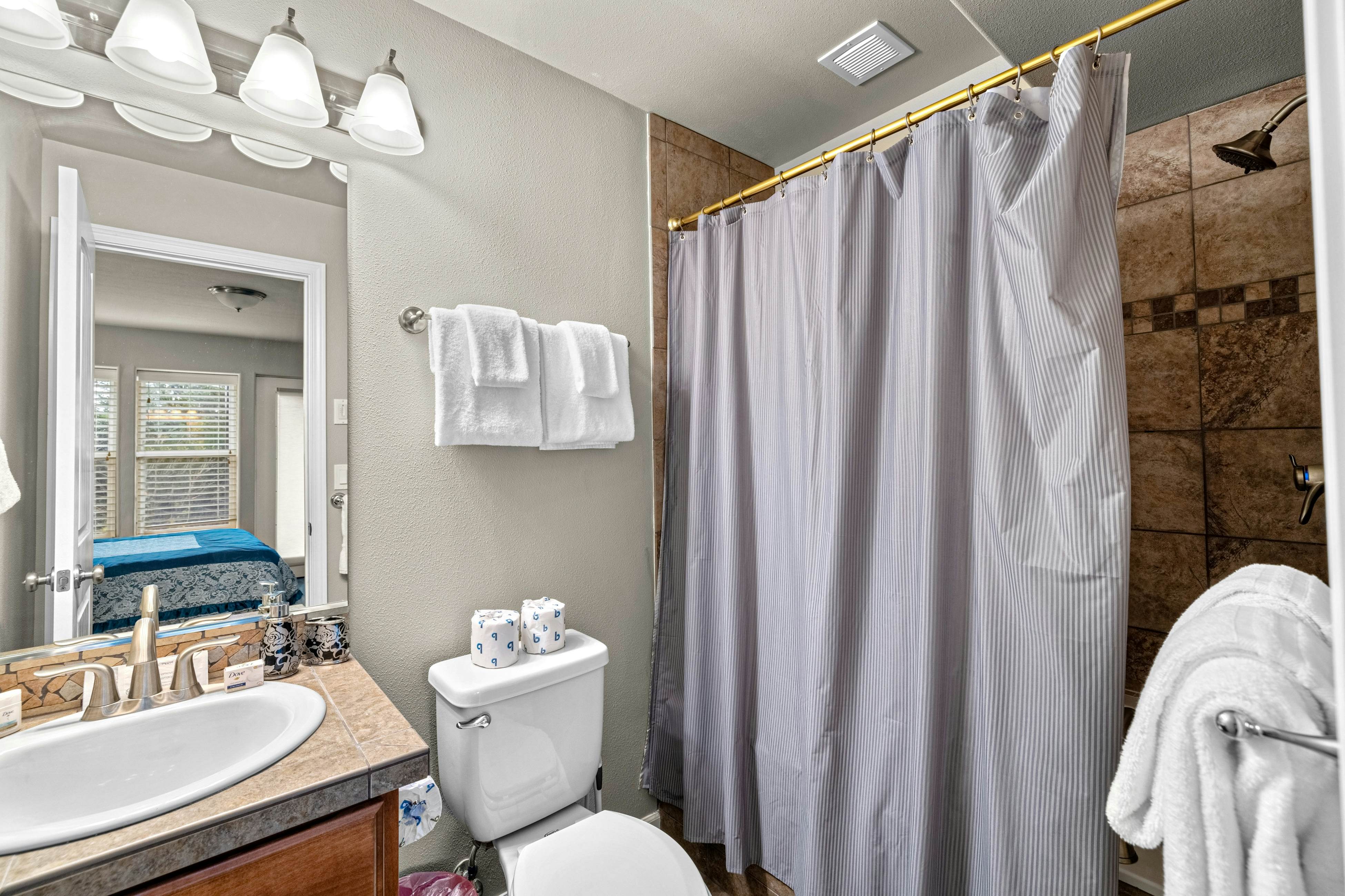 Three-story ocean view home with balconies, grill, & open layout - dog-friendly