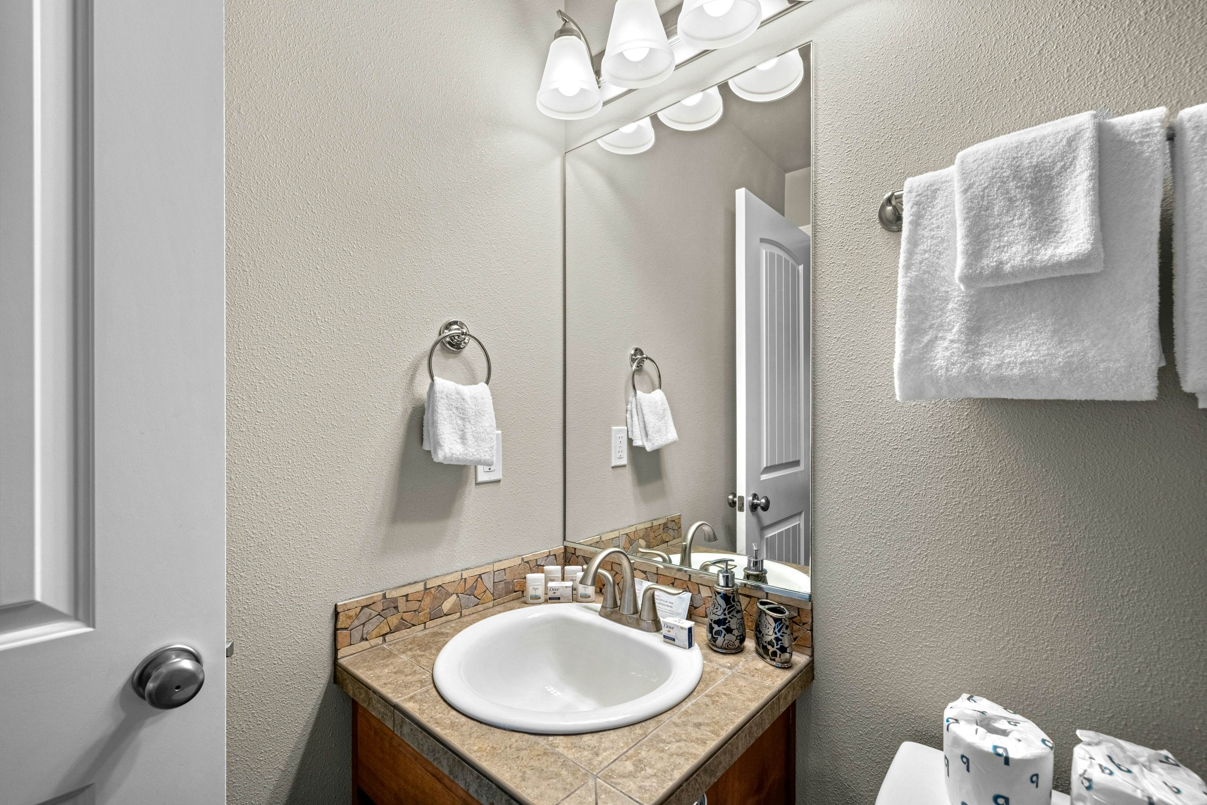 Three-story ocean view home with balconies, grill, & open layout - dog-friendly