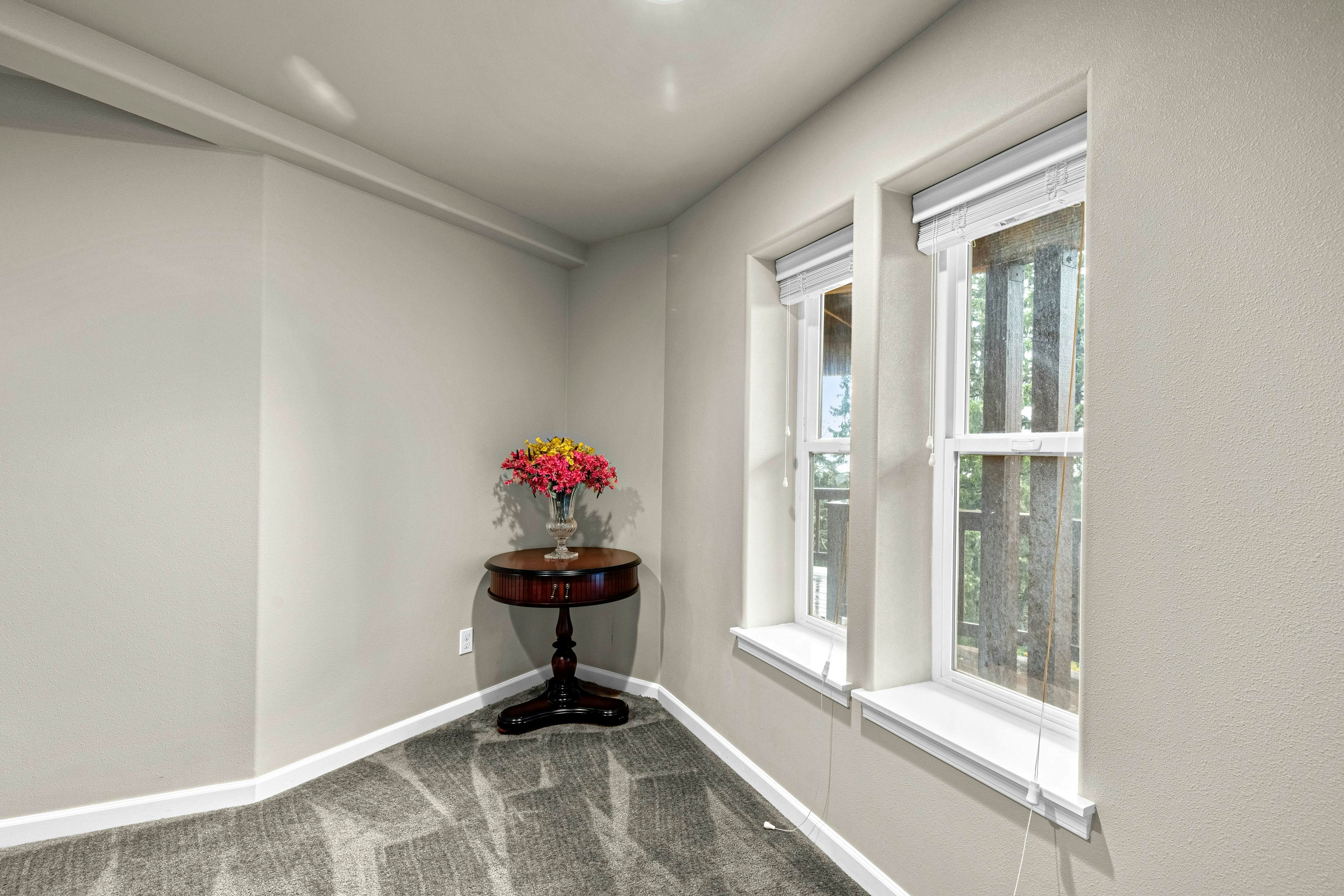 Three-story ocean view home with balconies, grill, & open layout - dog-friendly