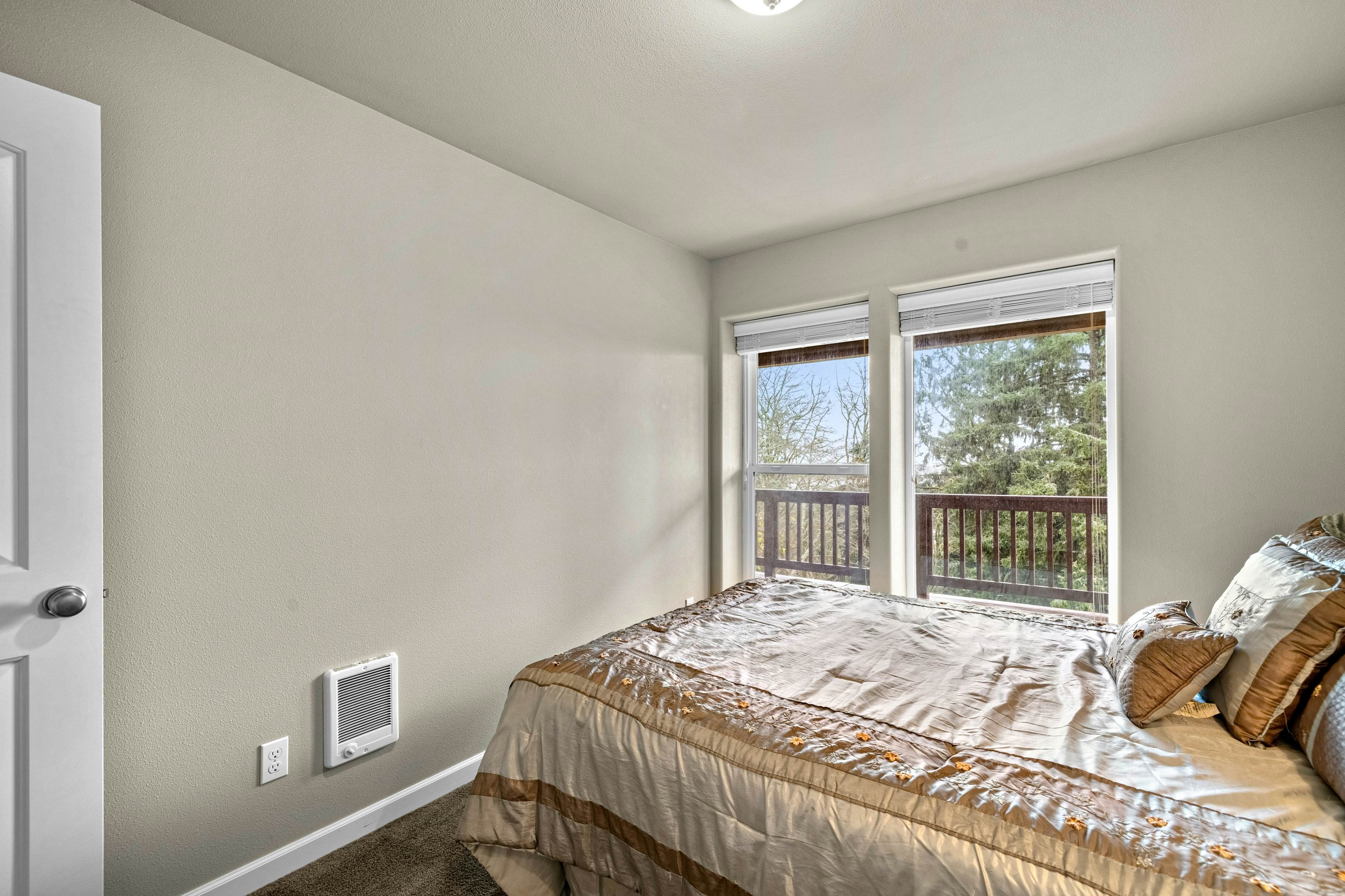 Three-story ocean view home with balconies, grill, & open layout - dog-friendly