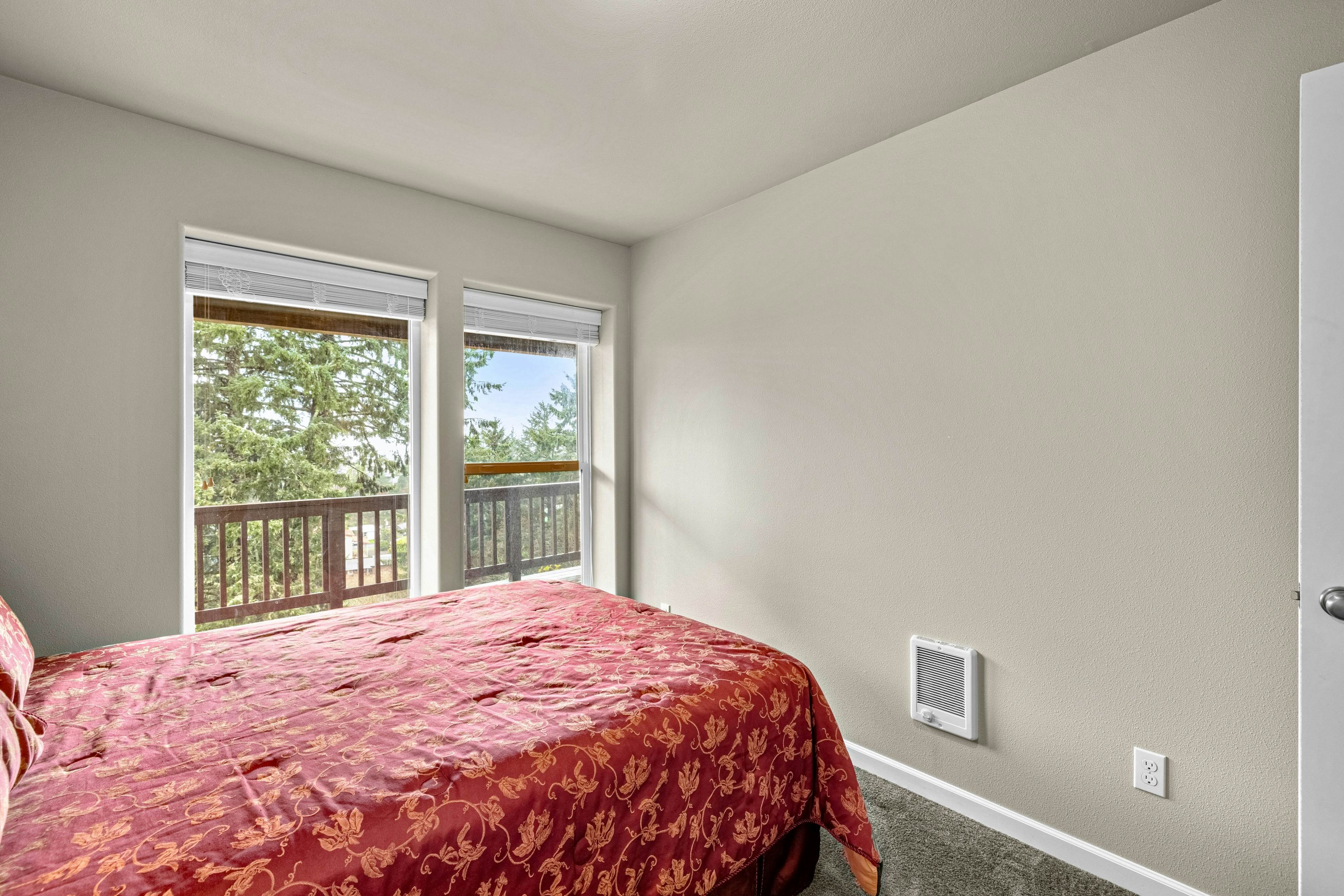 Three-story ocean view home with balconies, grill, & open layout - dog-friendly