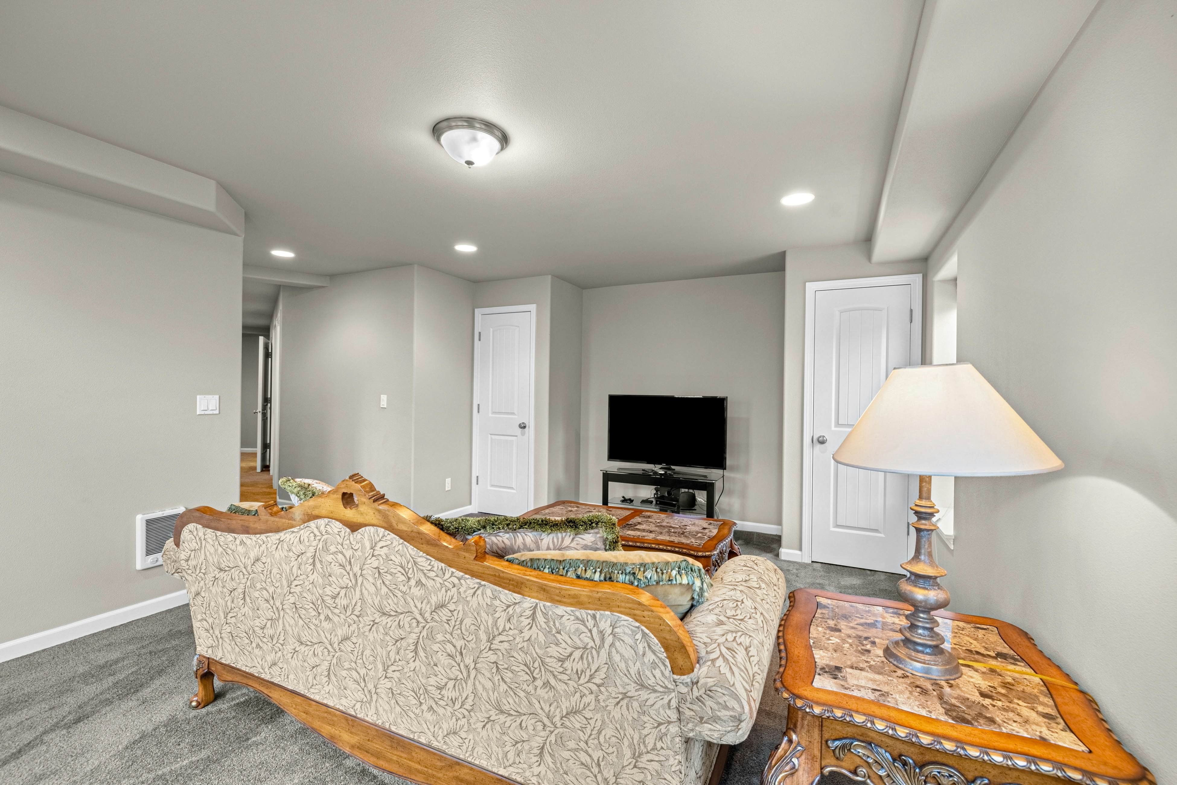 Three-story ocean view home with balconies, grill, & open layout - dog-friendly