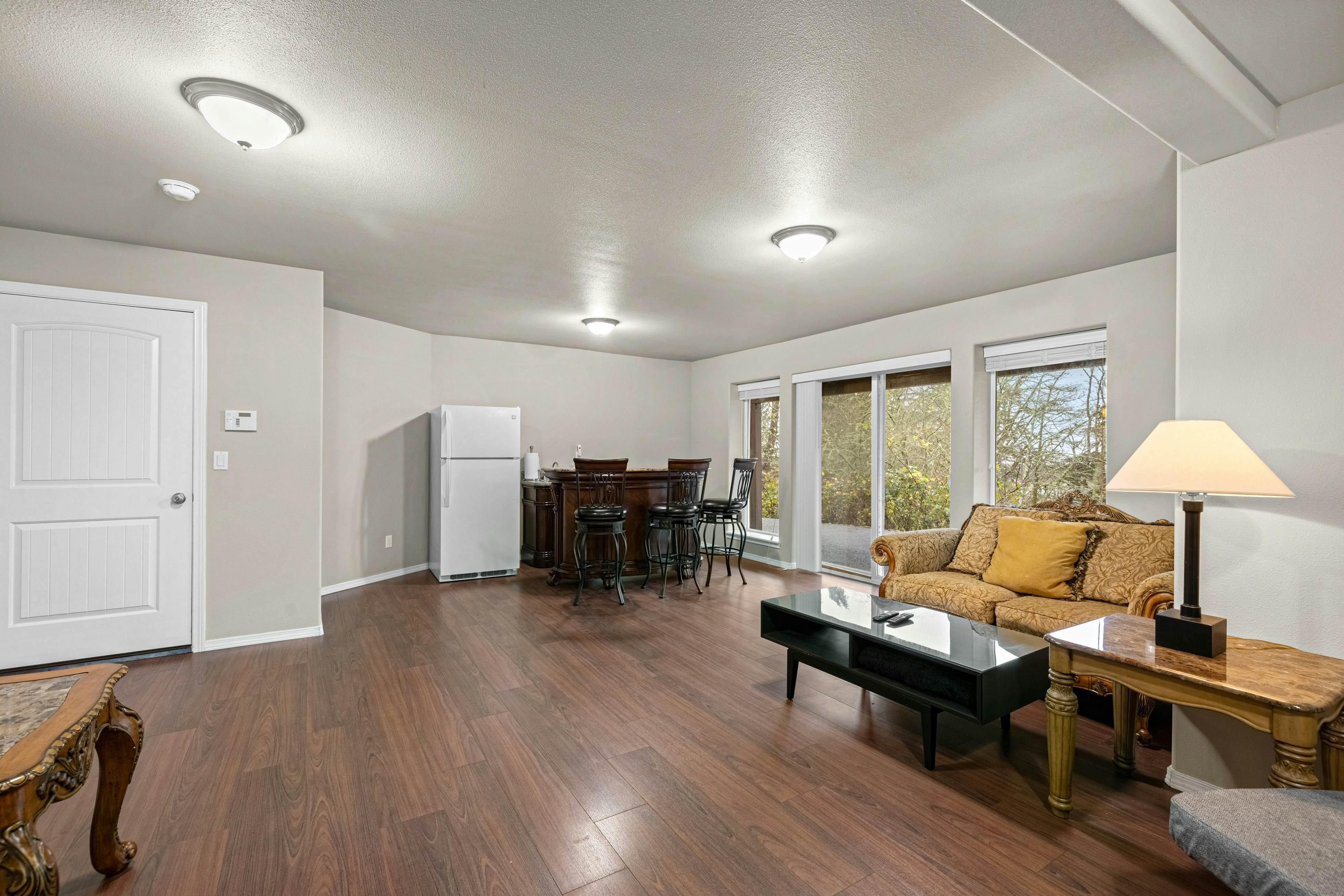 Three-story ocean view home with balconies, grill, & open layout - dog-friendly