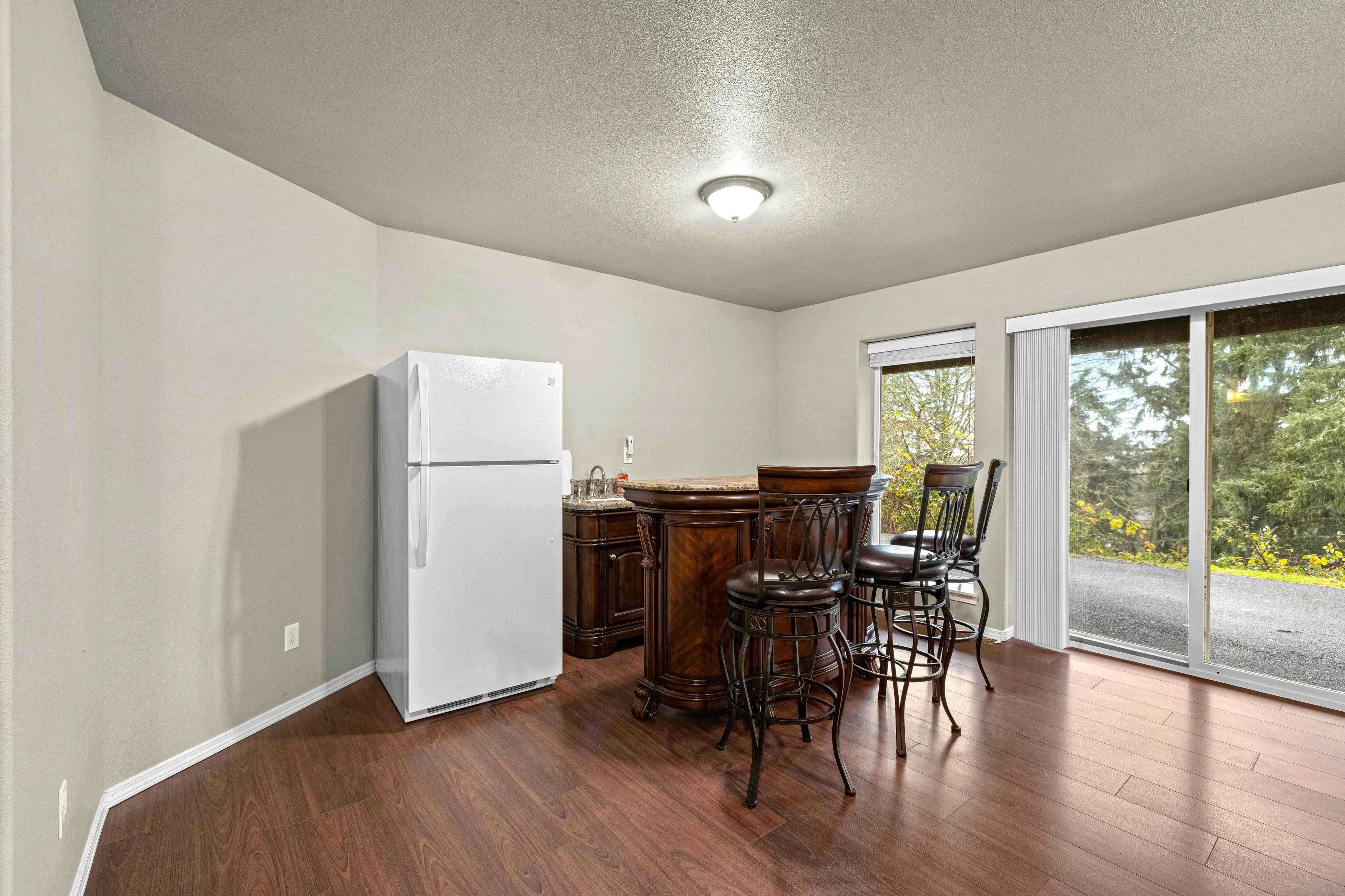 Three-story ocean view home with balconies, grill, & open layout - dog-friendly