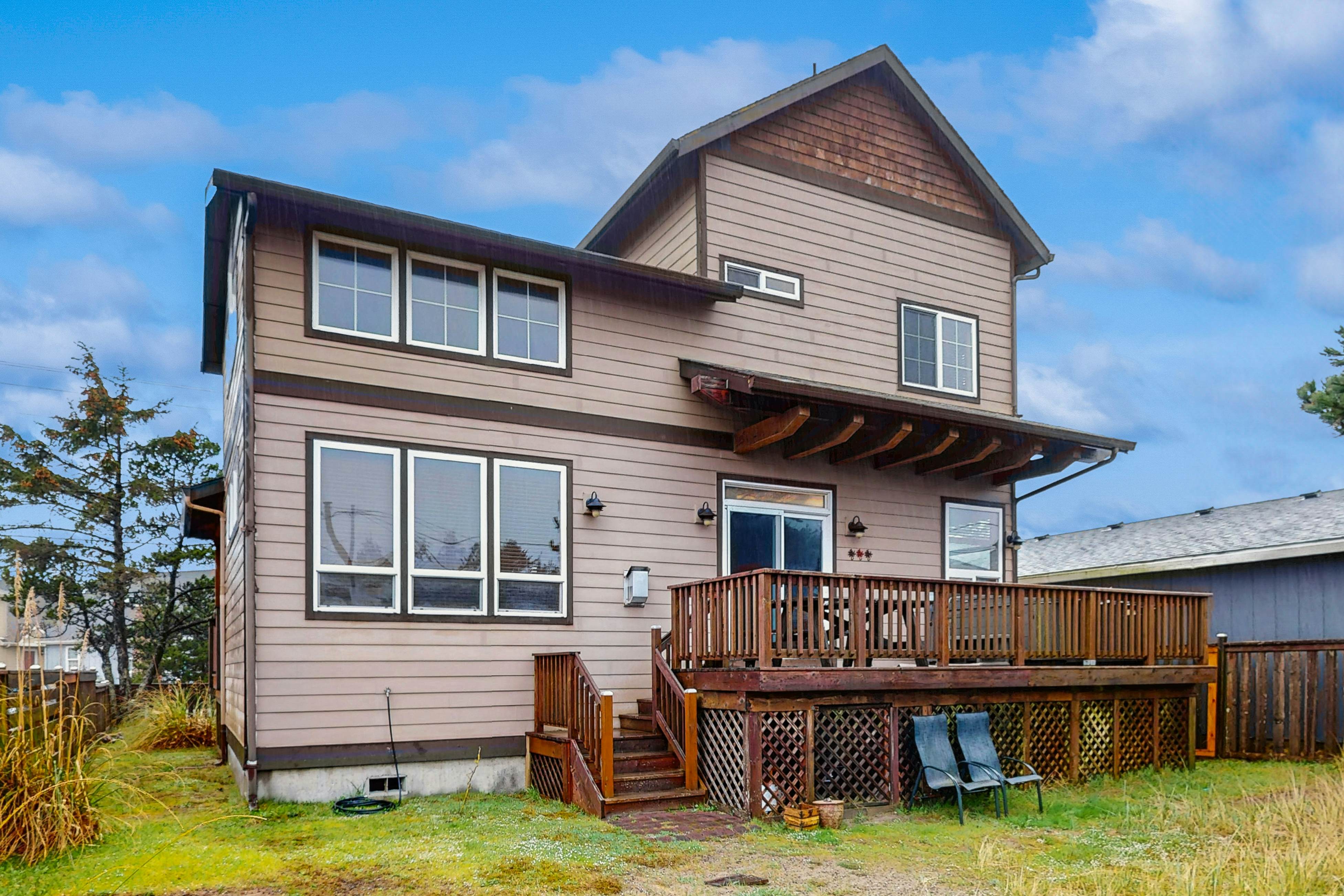 Family-friendly home with private hot tub, fireplace, & BBQ, close to beach