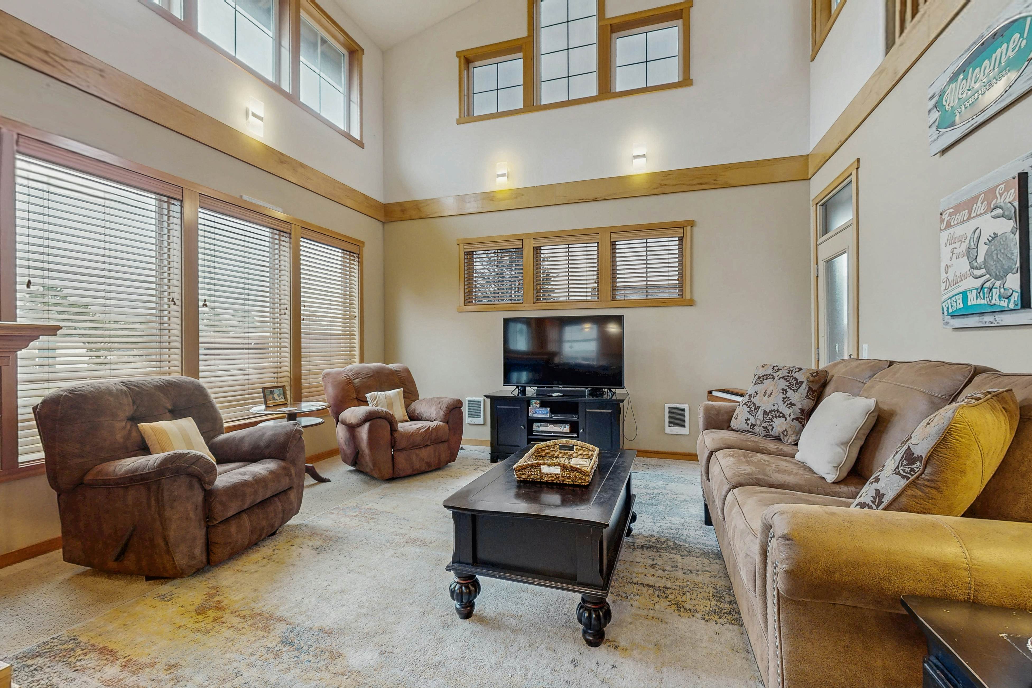 Family-friendly home with private hot tub, fireplace, & BBQ, close to beach