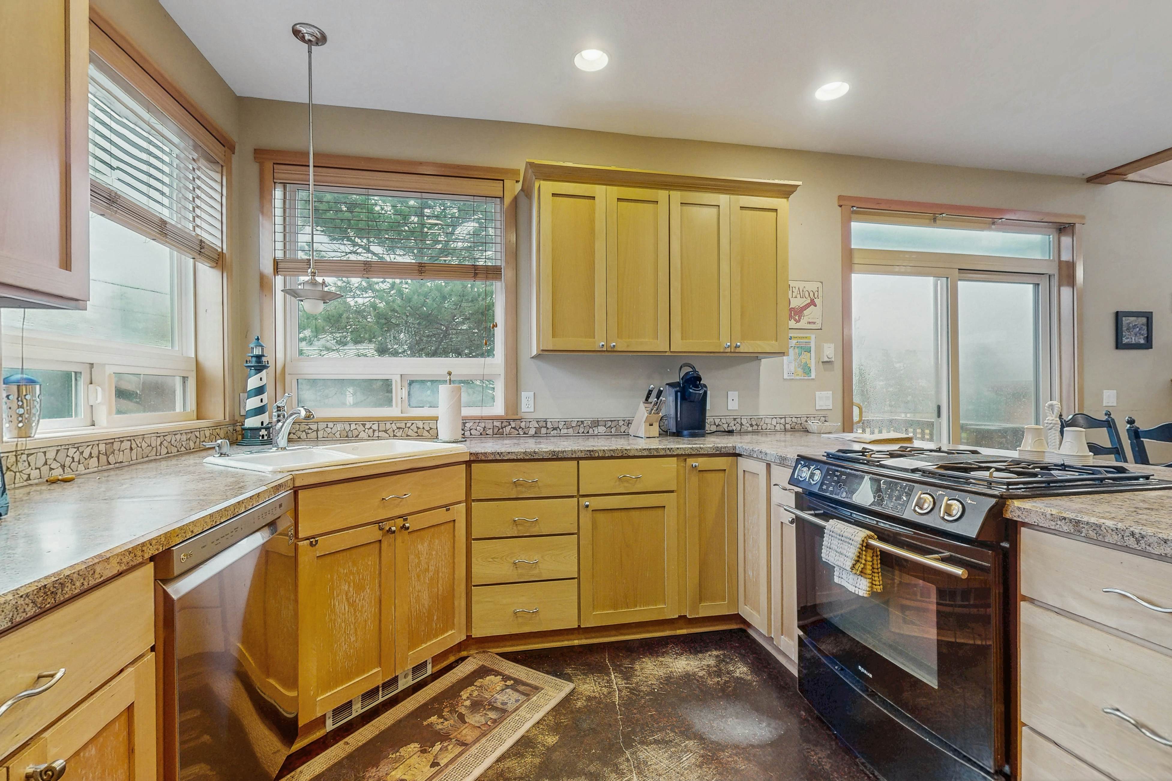 Family-friendly home with private hot tub, fireplace, & BBQ, close to beach