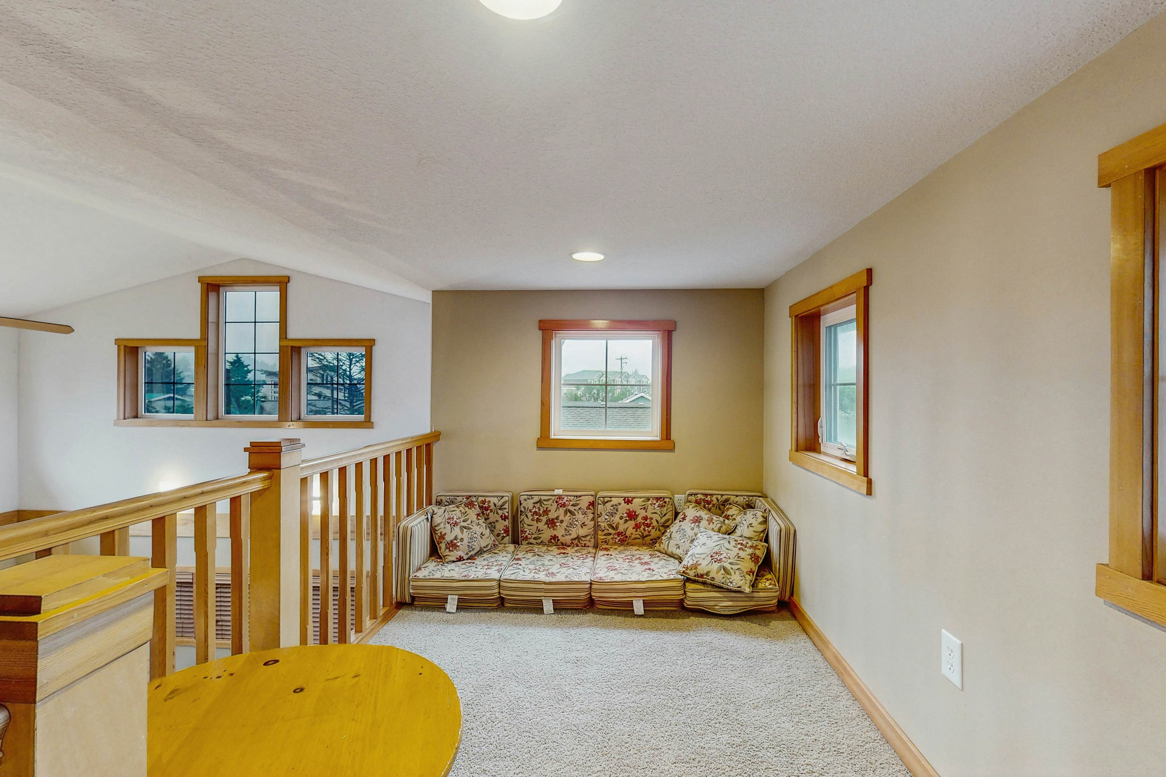 Family-friendly home with private hot tub, fireplace, & BBQ, close to beach