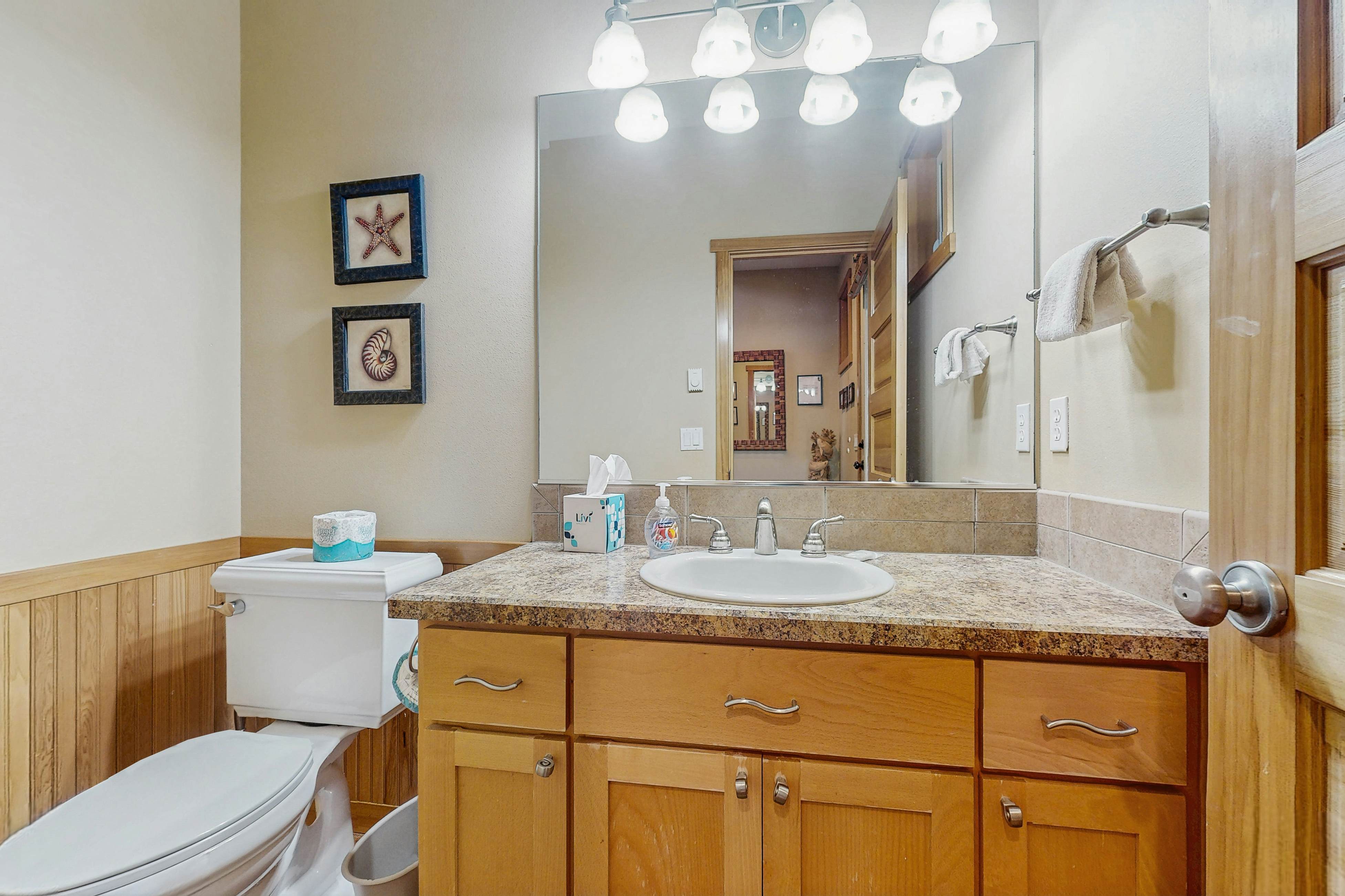 Family-friendly home with private hot tub, fireplace, & BBQ, close to beach